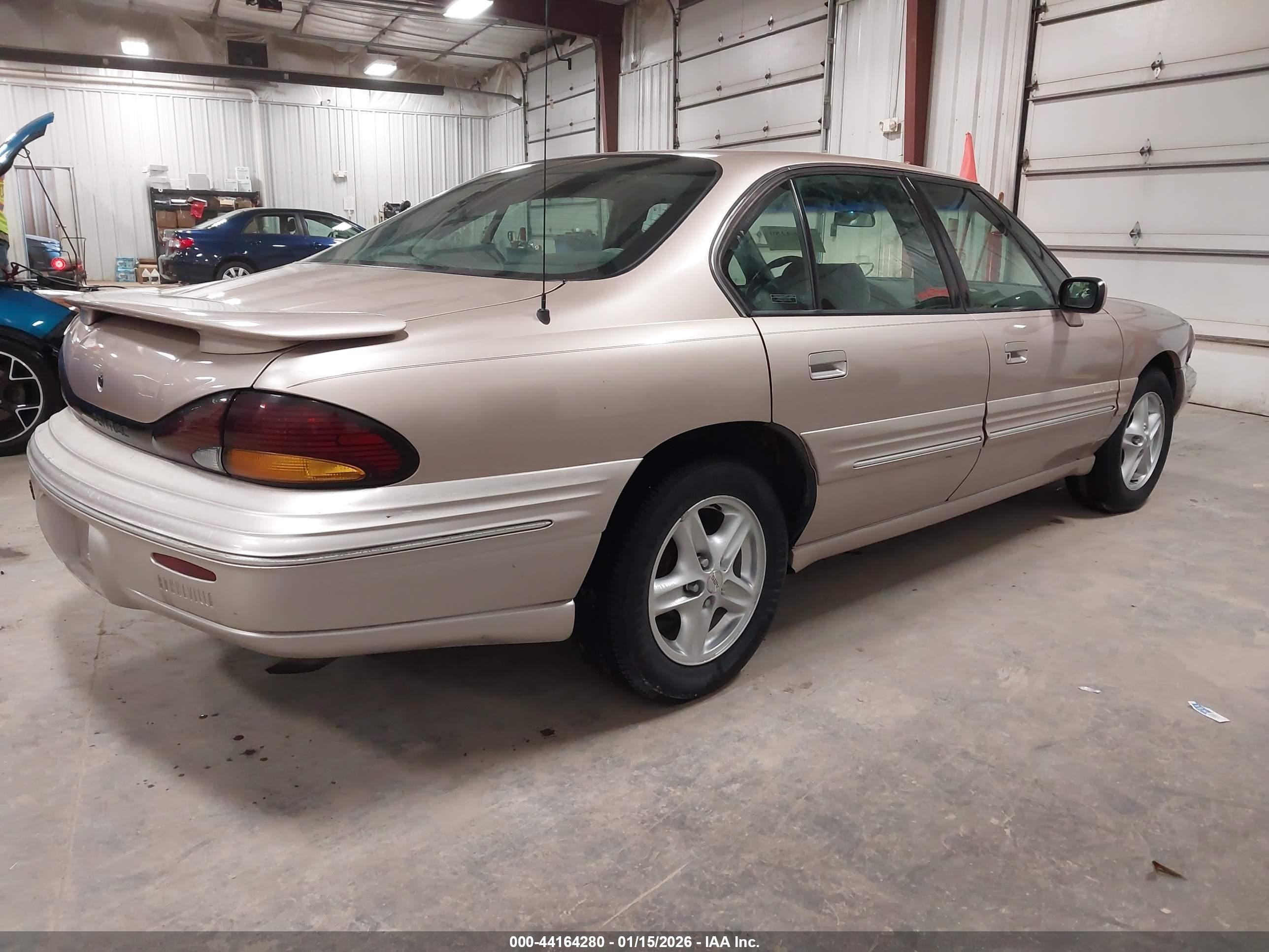 1999 Pontiac Bonneville Se Beige vin: 1G2HX52K3XH248866