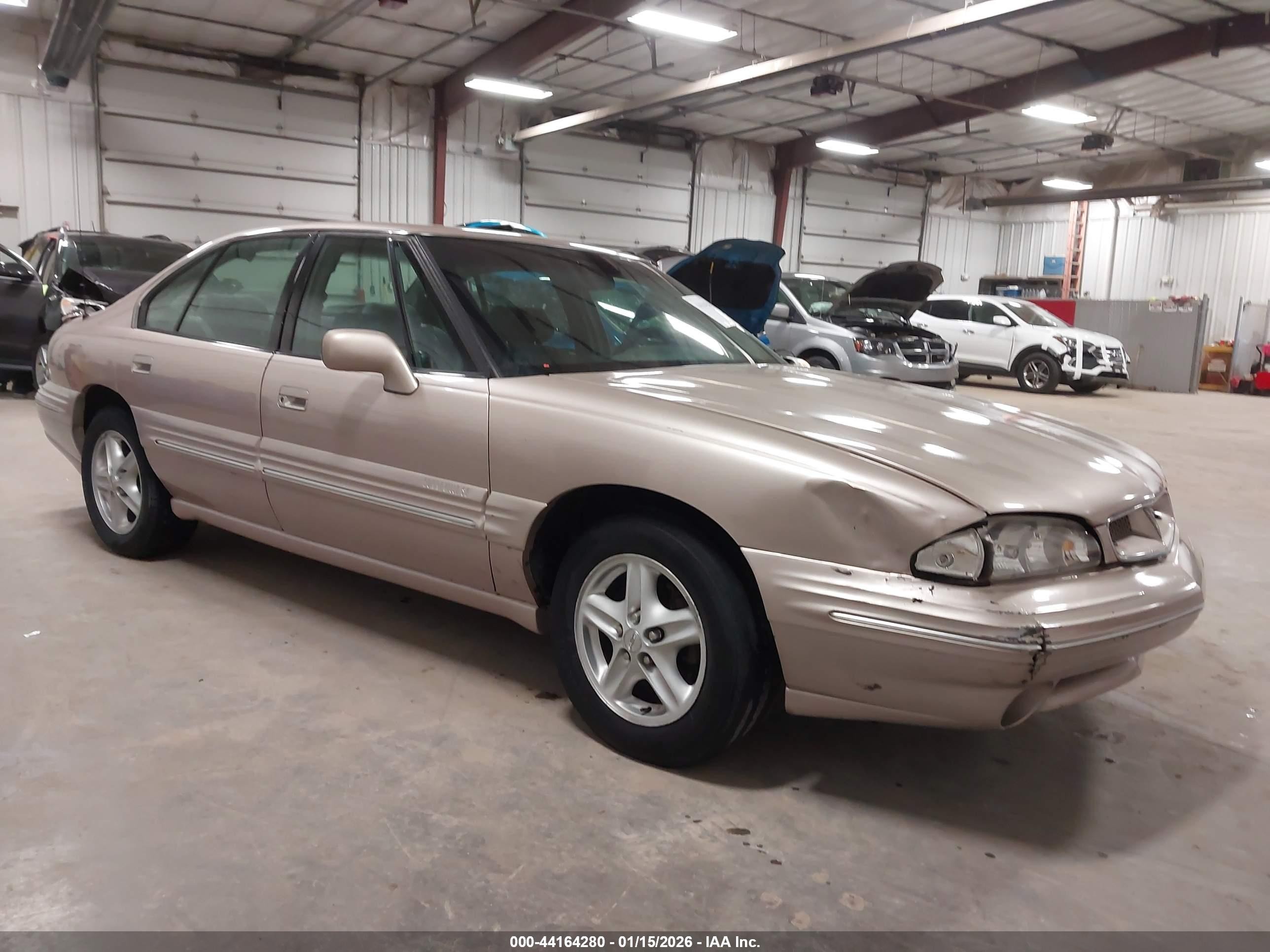 1999 Pontiac Bonneville Se Beige vin: 1G2HX52K3XH248866