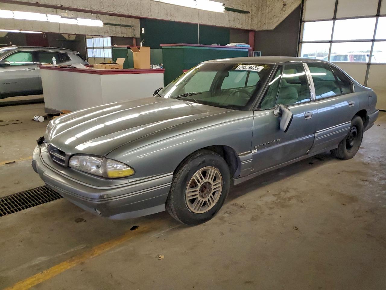 1992 Pontiac Bonneville Se Серый vin: 1G2HX53L4N1290993