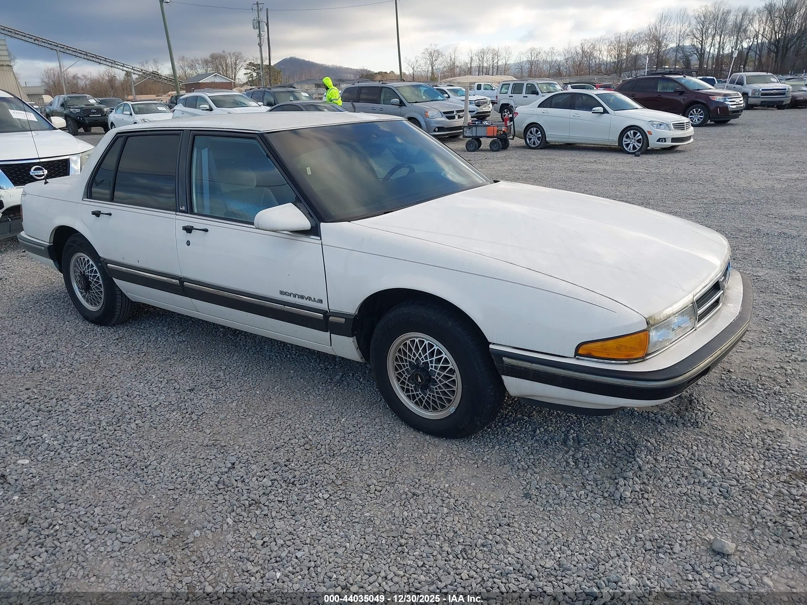 1989 Pontiac Bonneville Le White vin: 1G2HX54C5KW249589
