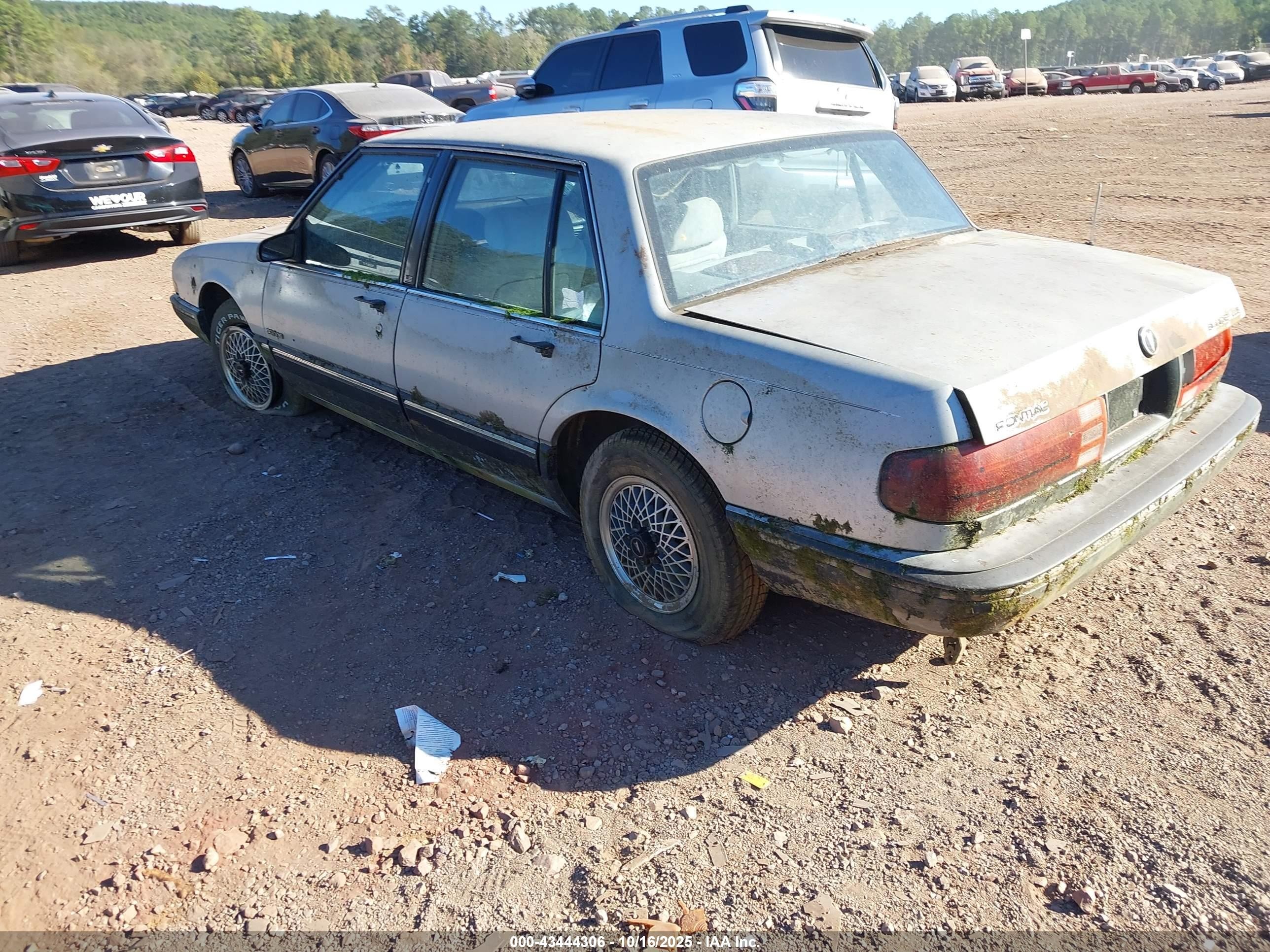 1989 Pontiac Bonneville Le Silver vin: 1G2HX54CXKW249703