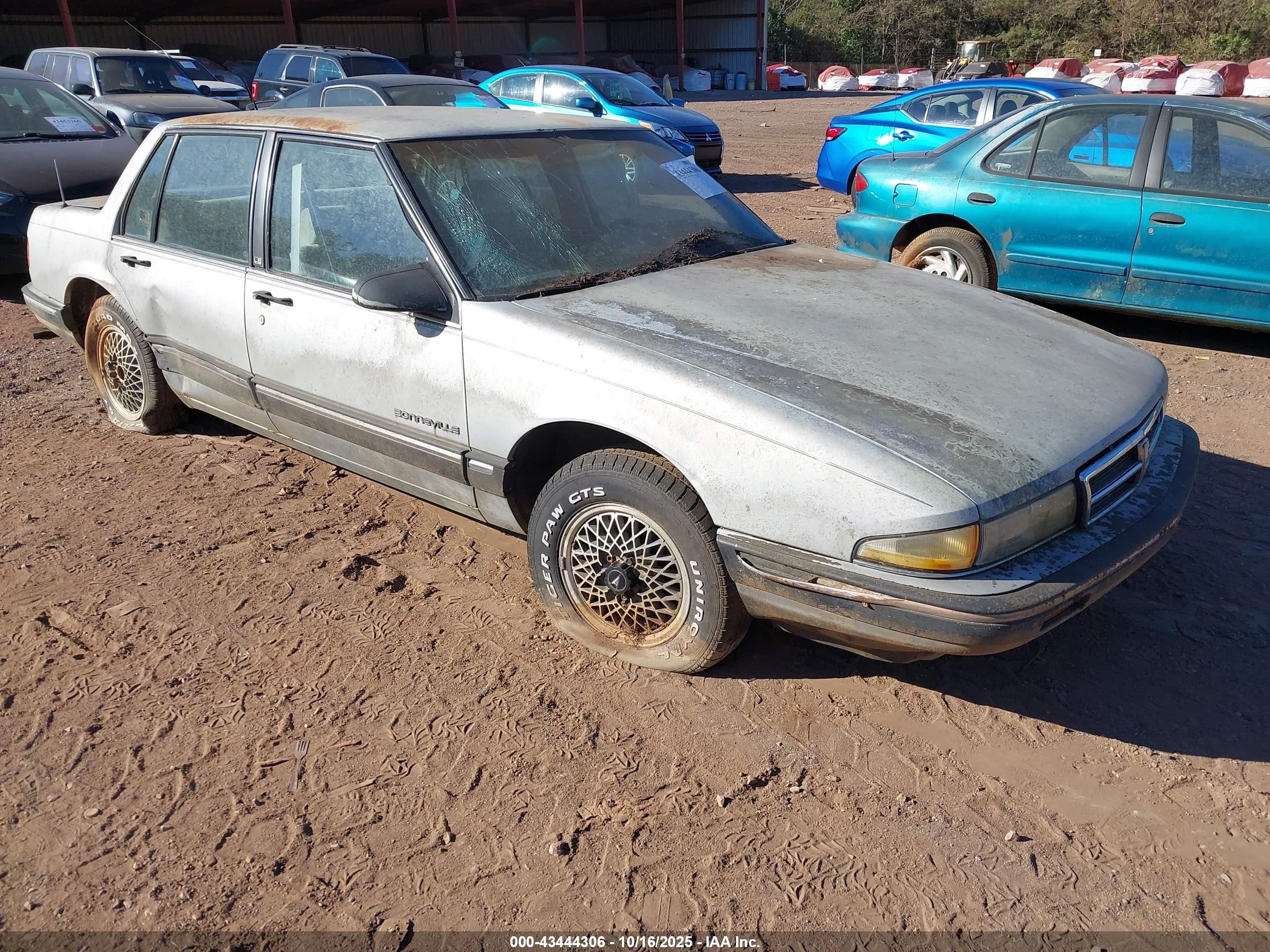 1989 Pontiac Bonneville Le Silver vin: 1G2HX54CXKW249703