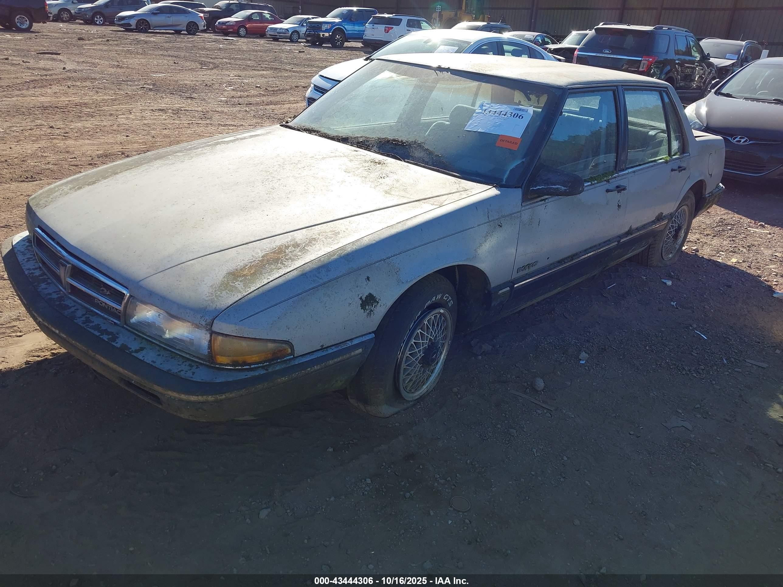 1989 Pontiac Bonneville Le Silver vin: 1G2HX54CXKW249703