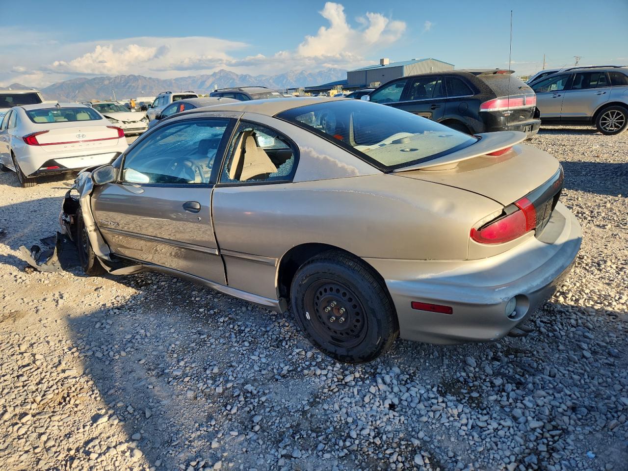 2001 Pontiac Sunfire Se Tan vin: 1G2JB124217329042