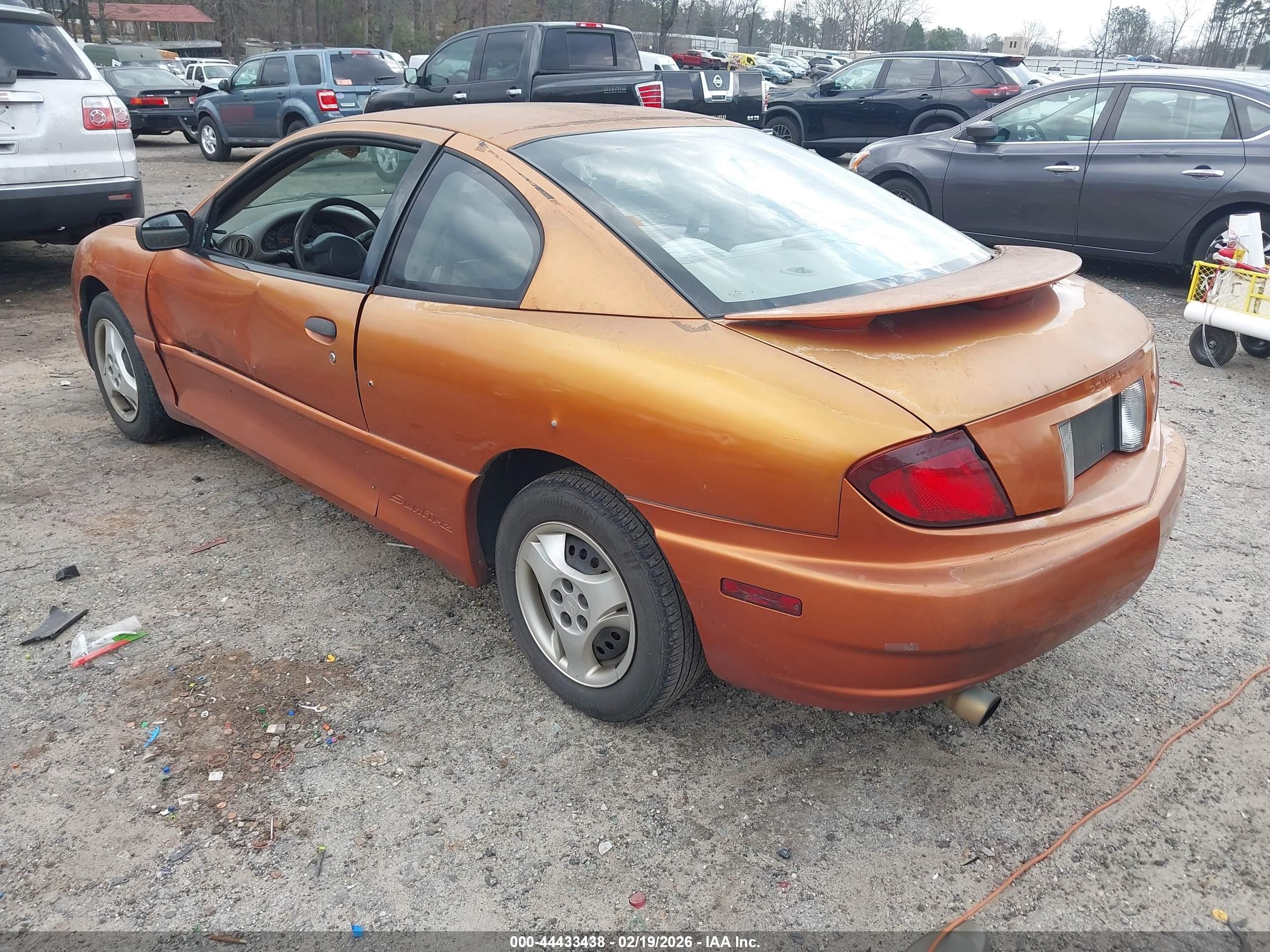 2004 Pontiac Sunfire   Orange vin: 1G2JB12F147114354