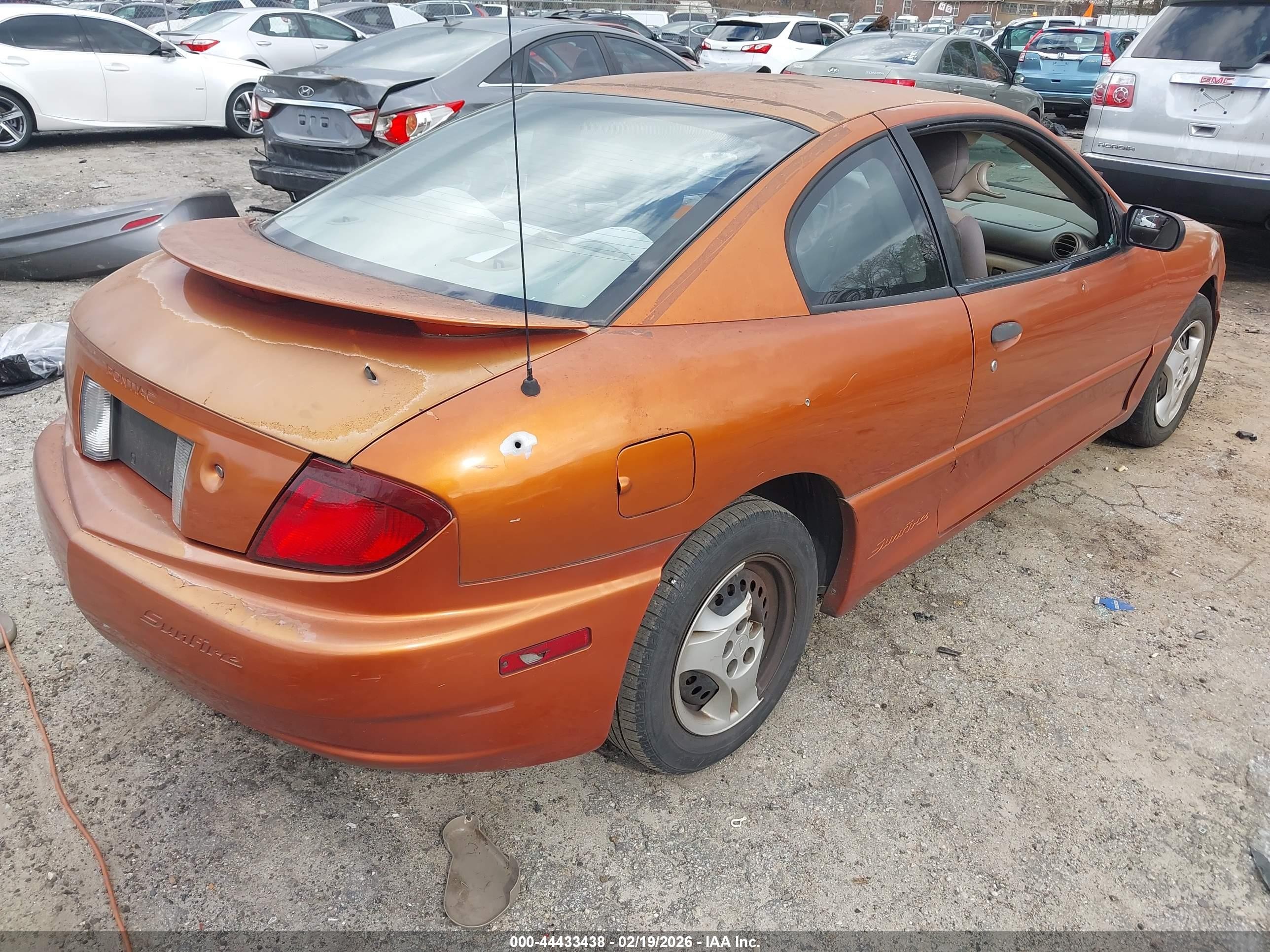 2004 Pontiac Sunfire   Orange vin: 1G2JB12F147114354