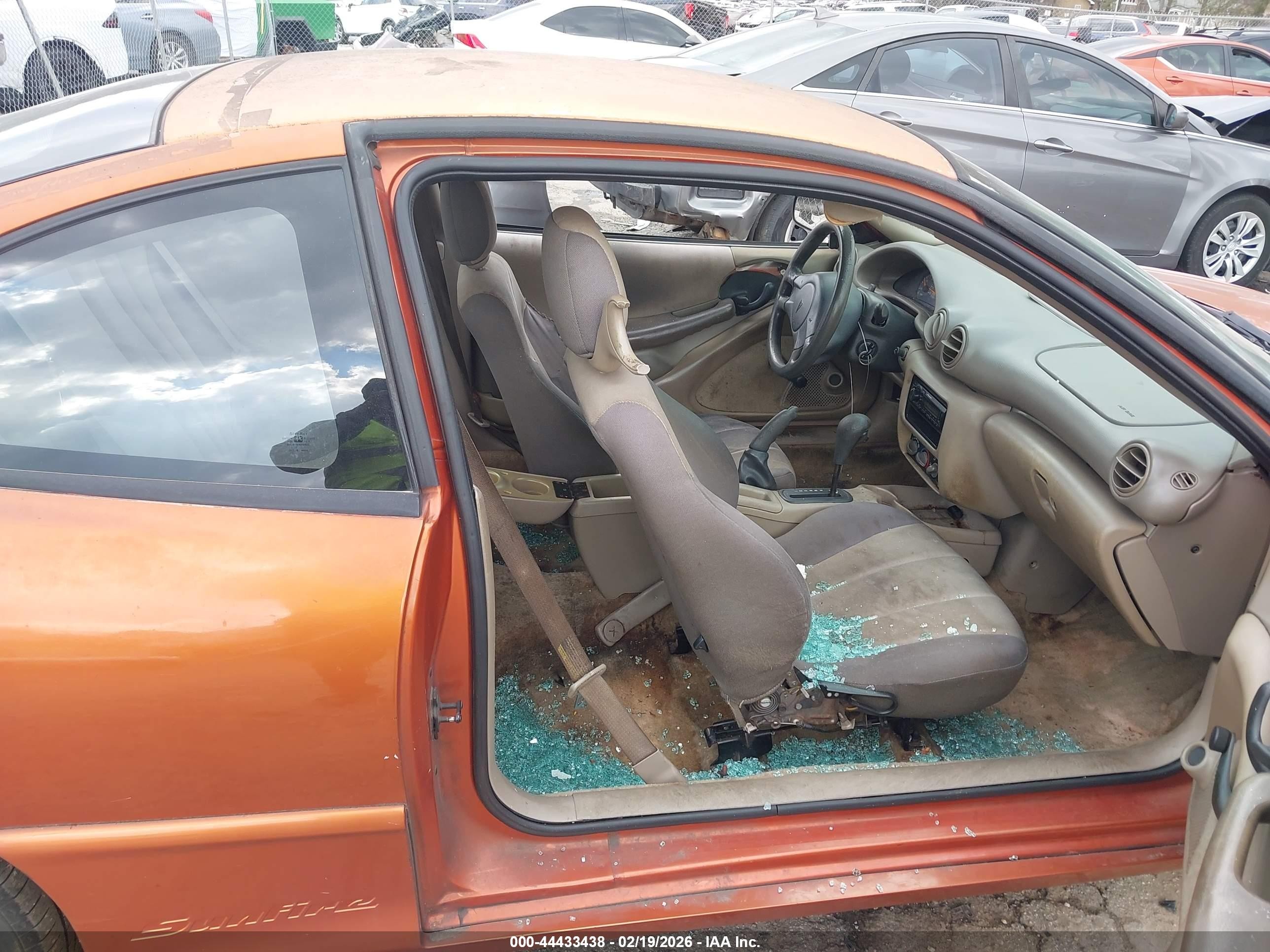 2004 Pontiac Sunfire   Orange vin: 1G2JB12F147114354
