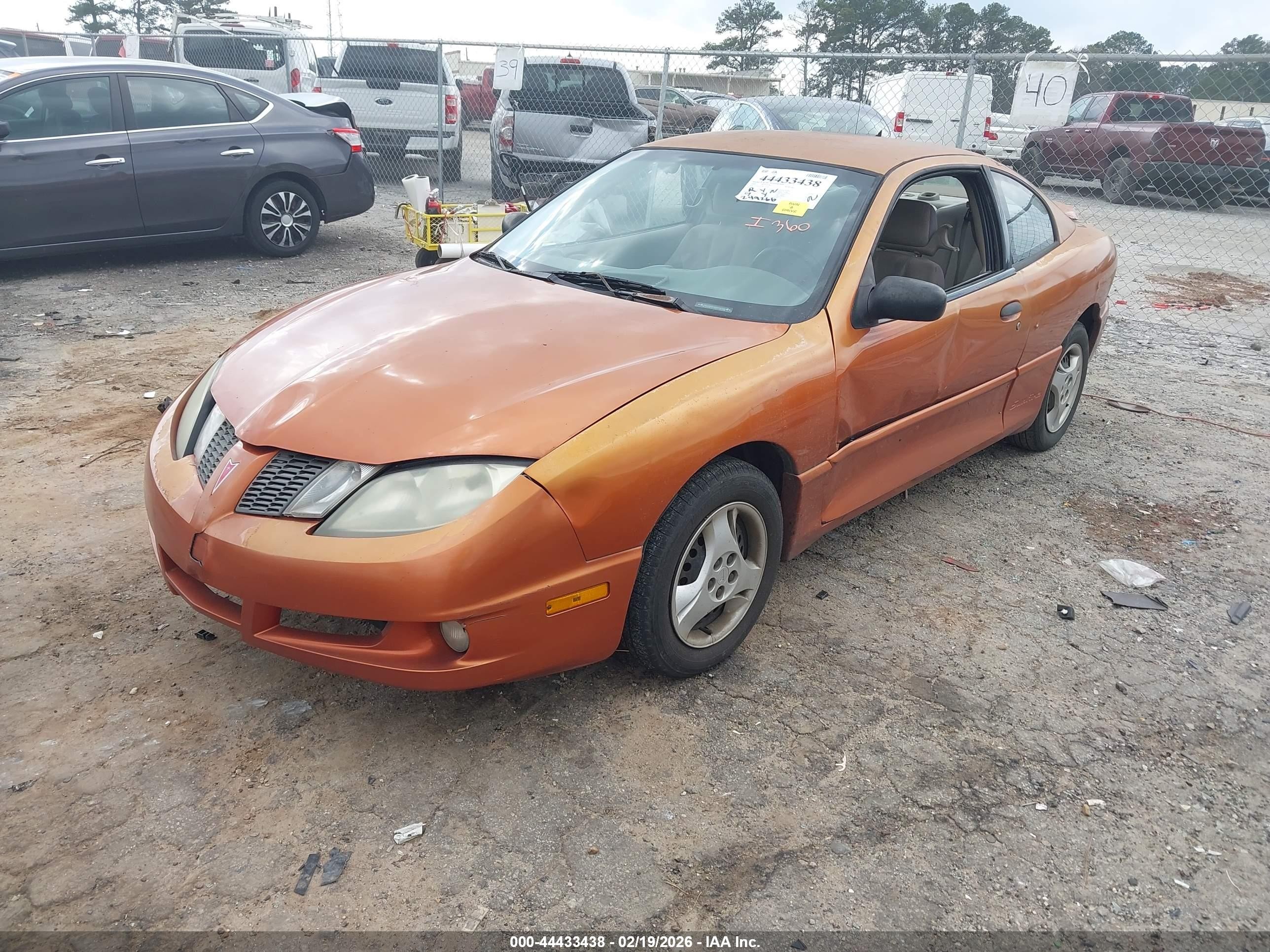 2004 Pontiac Sunfire   Orange vin: 1G2JB12F147114354