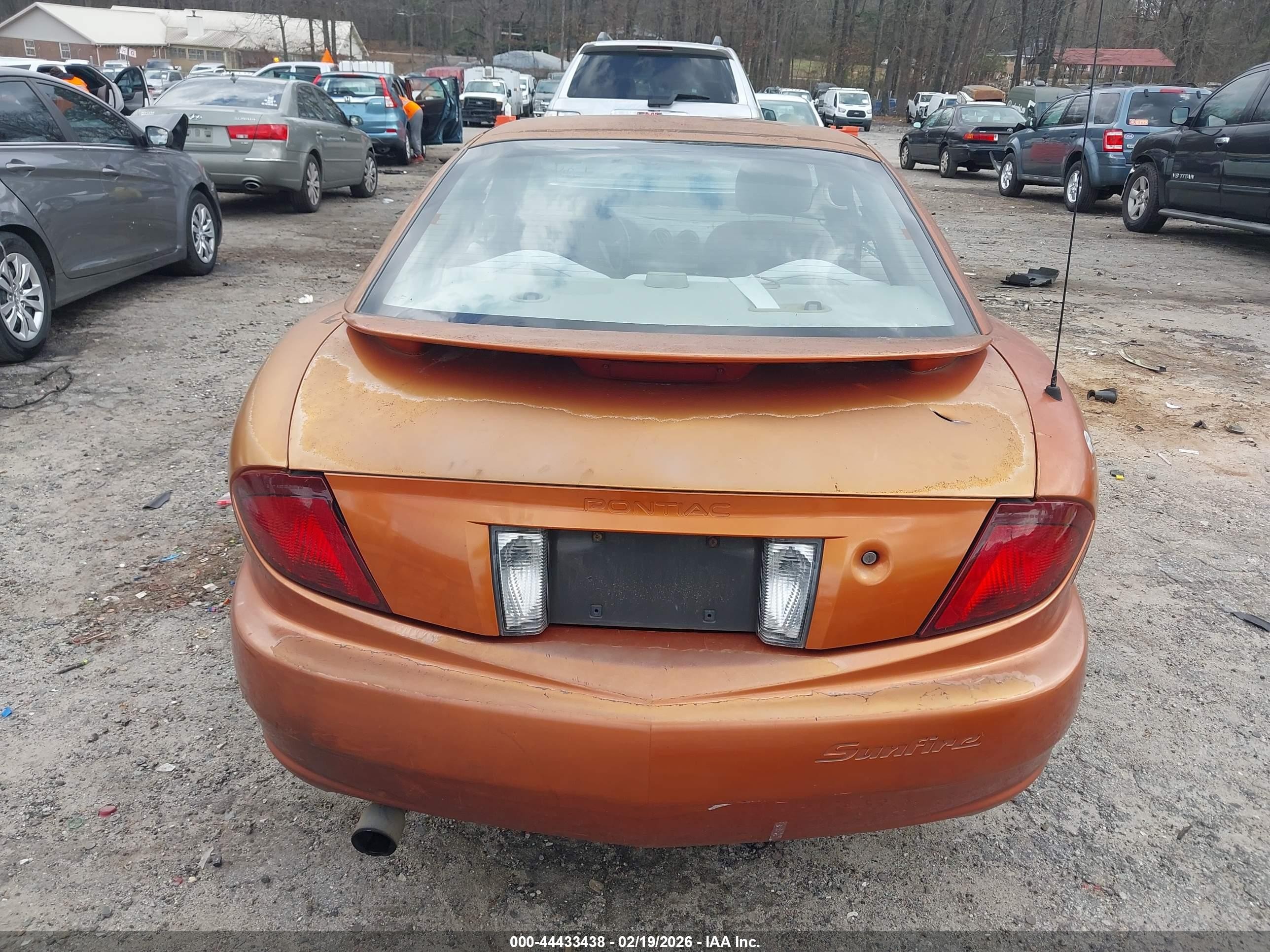2004 Pontiac Sunfire   Orange vin: 1G2JB12F147114354