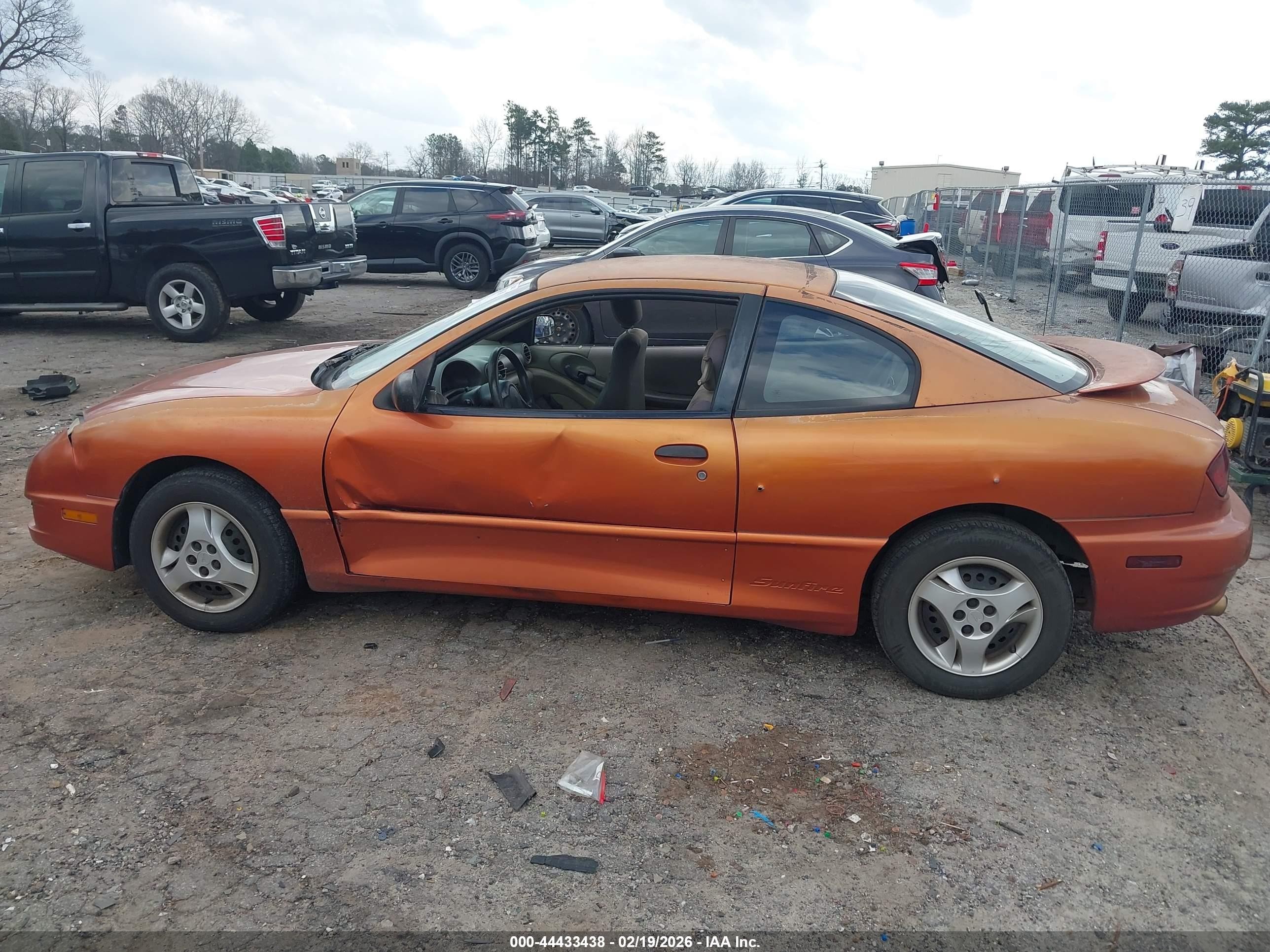 2004 Pontiac Sunfire   Orange vin: 1G2JB12F147114354