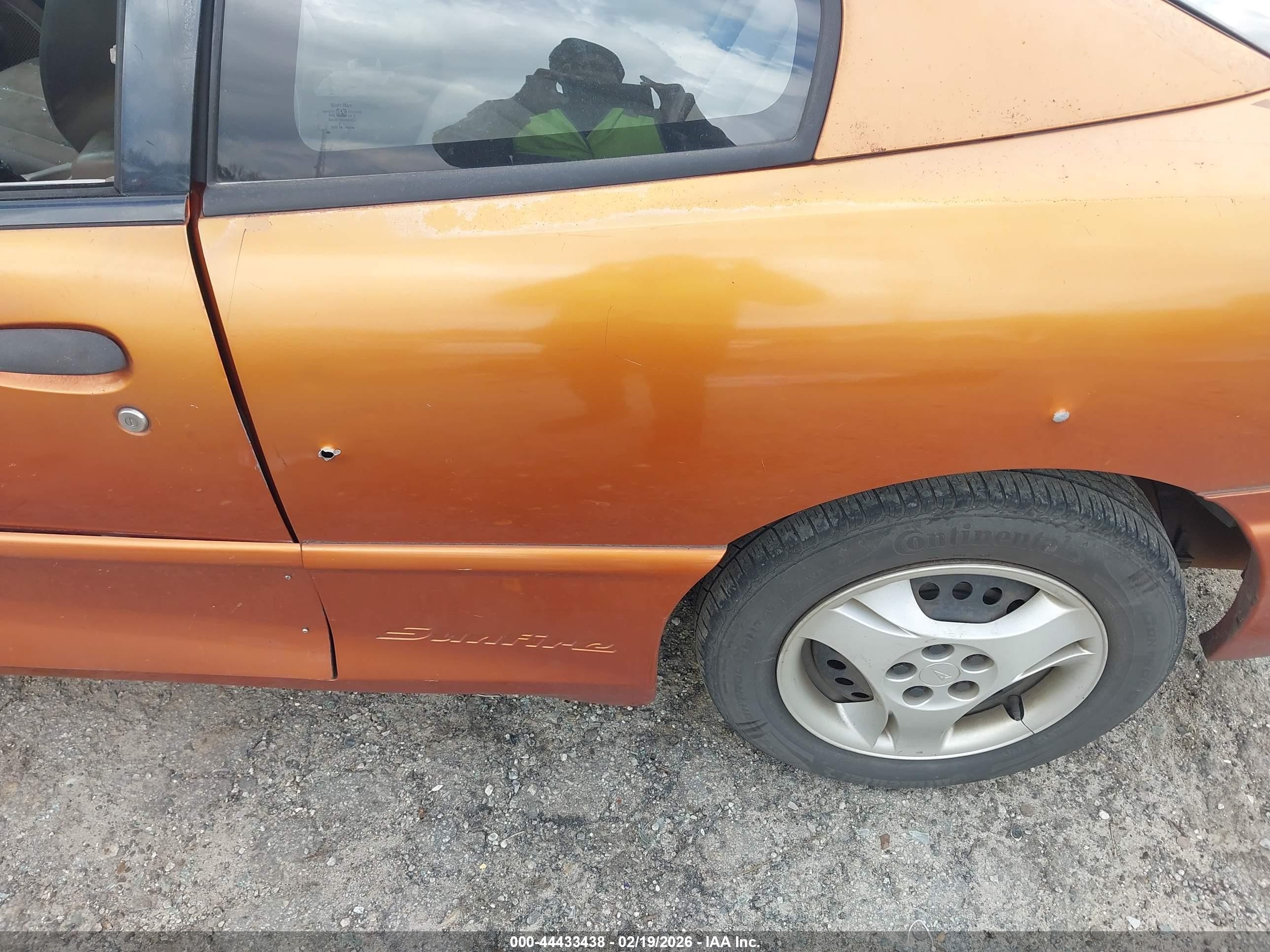 2004 Pontiac Sunfire   Orange vin: 1G2JB12F147114354