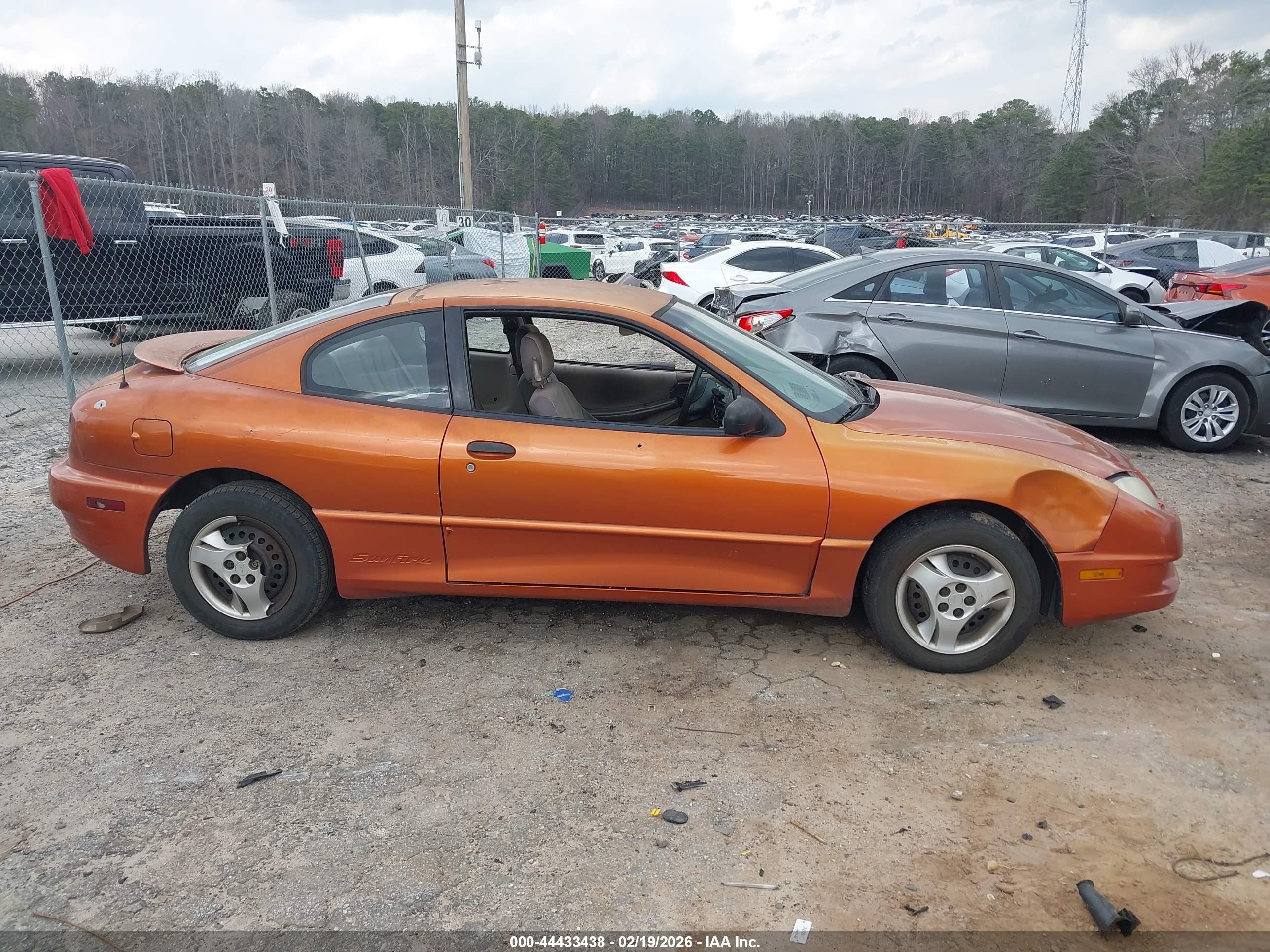 2004 Pontiac Sunfire   Orange vin: 1G2JB12F147114354