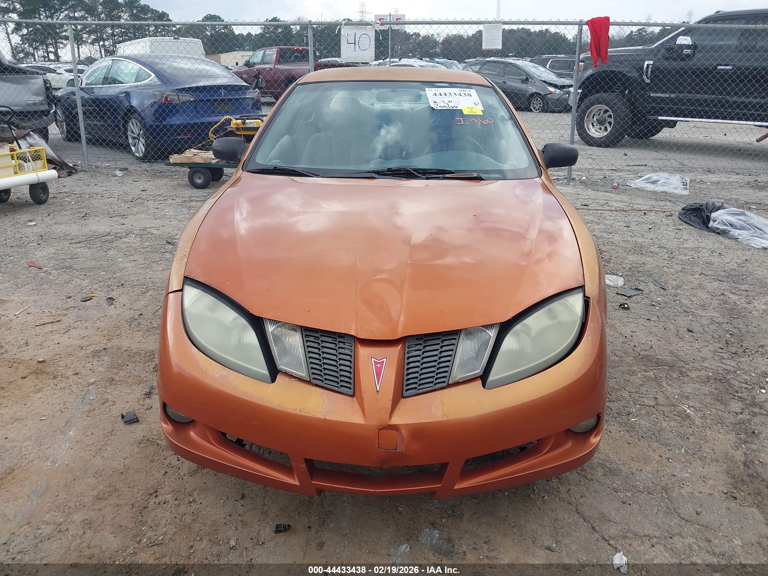 2004 Pontiac Sunfire   Orange vin: 1G2JB12F147114354