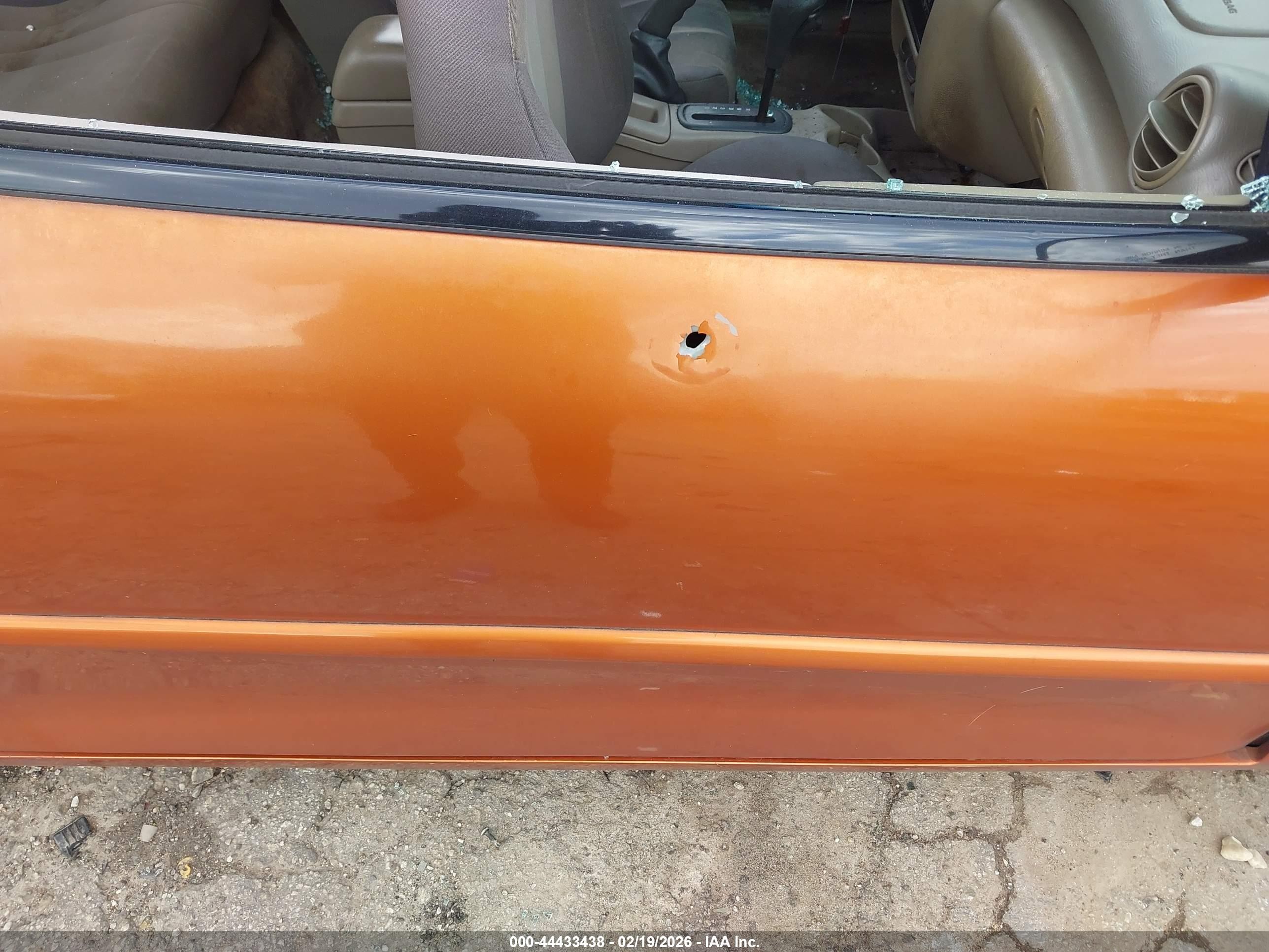 2004 Pontiac Sunfire   Orange vin: 1G2JB12F147114354