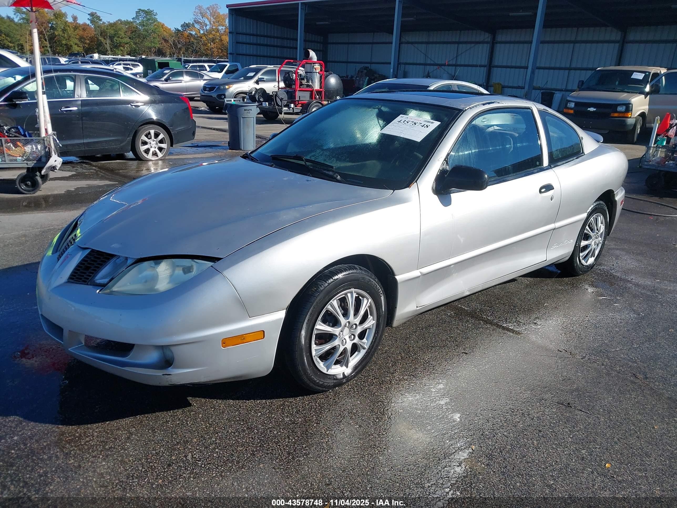 2003 Pontiac Sunfire   Silver vin: 1G2JB12F437354982