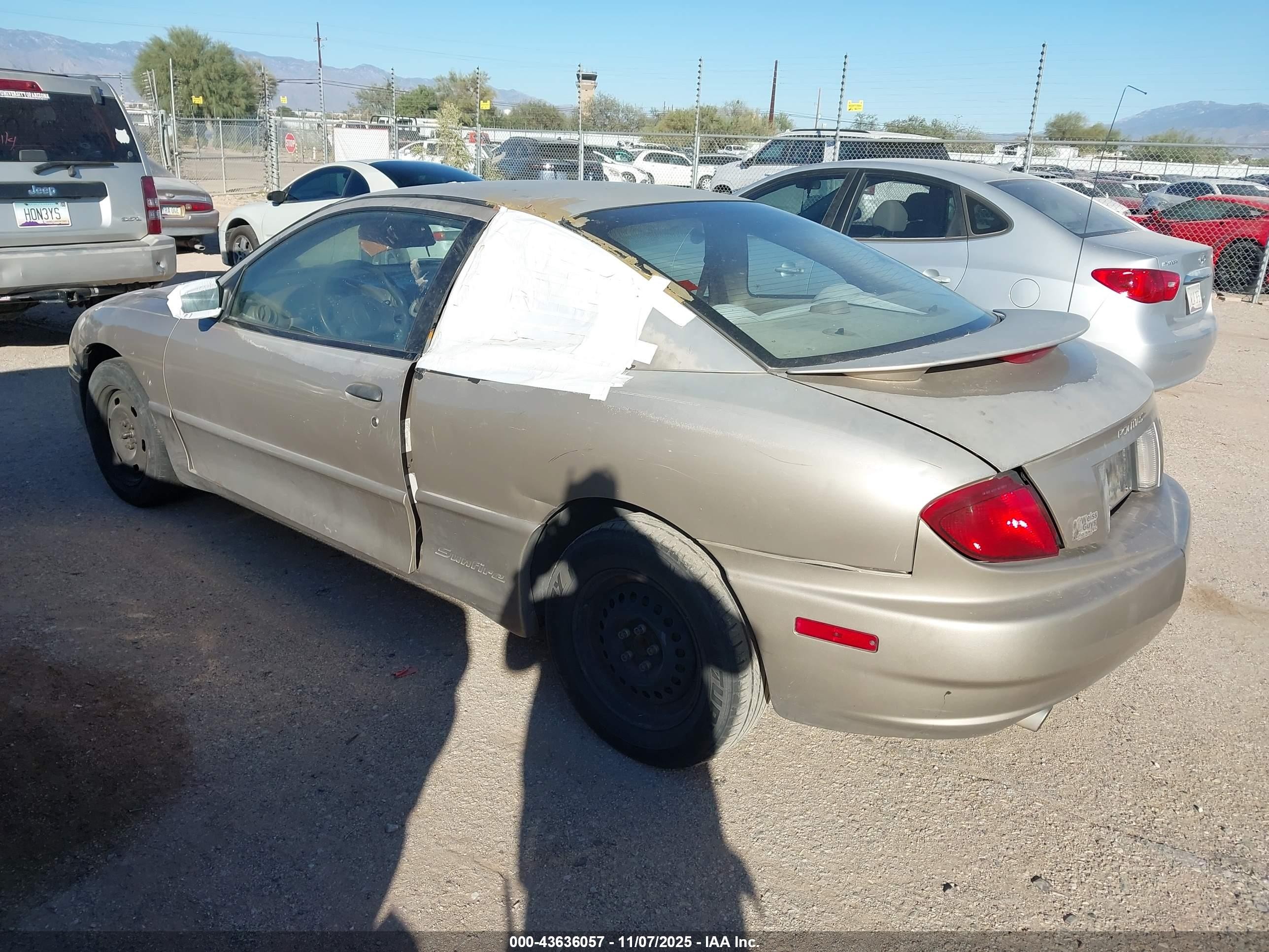 2003 Pontiac Sunfire   Tan vin: 1G2JB12F637113764