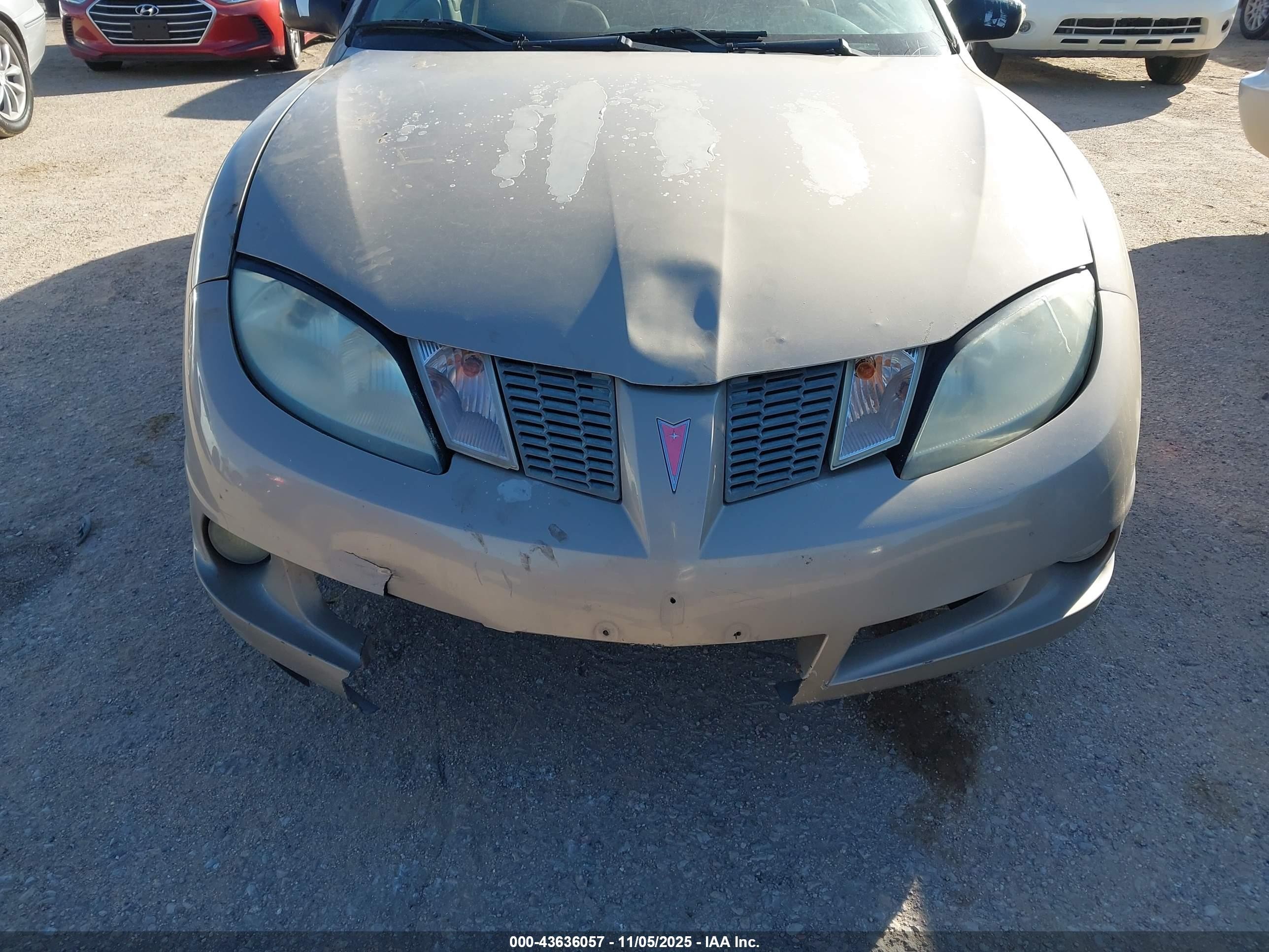 2003 Pontiac Sunfire   Tan vin: 1G2JB12F637113764