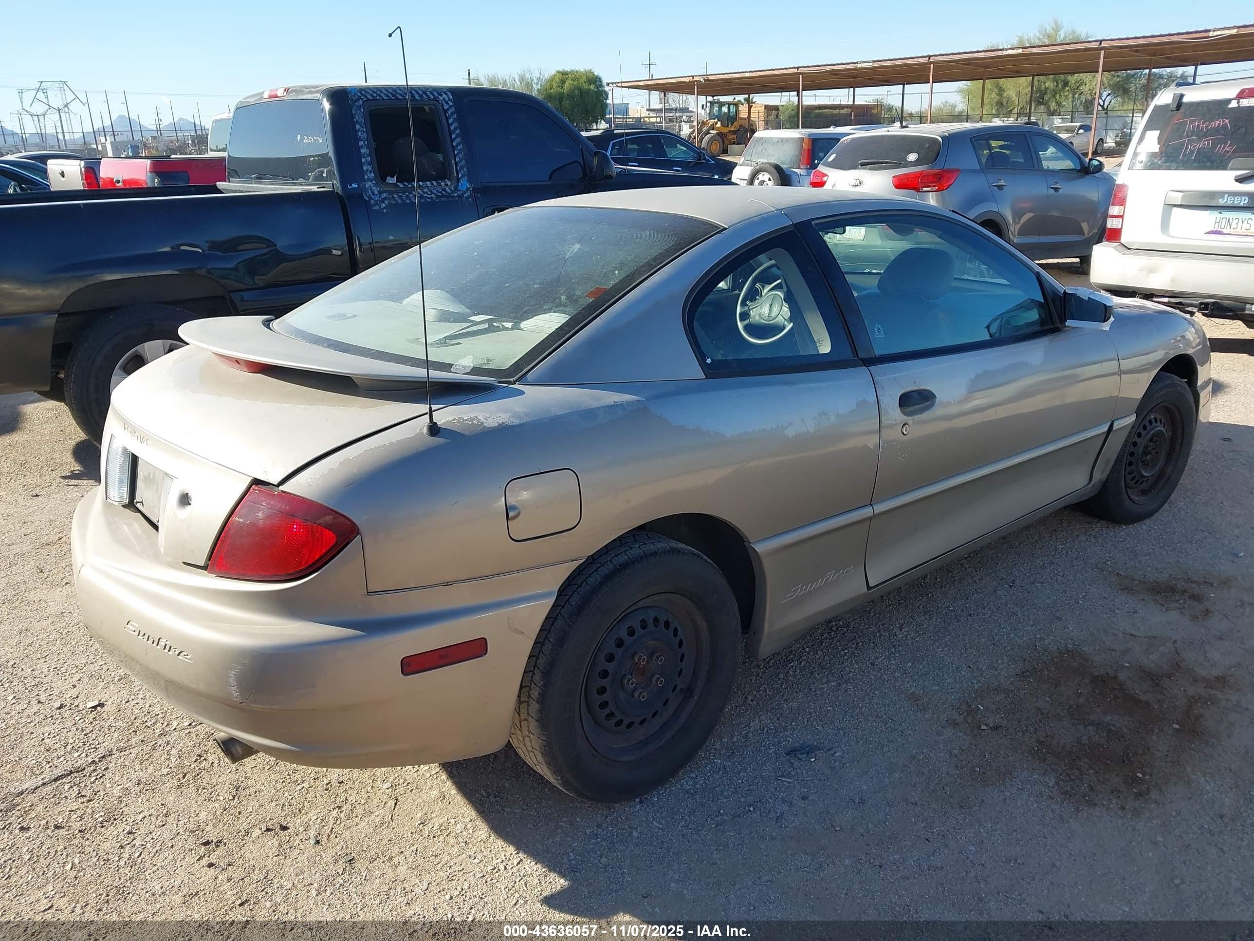 2003 Pontiac Sunfire   Tan vin: 1G2JB12F637113764