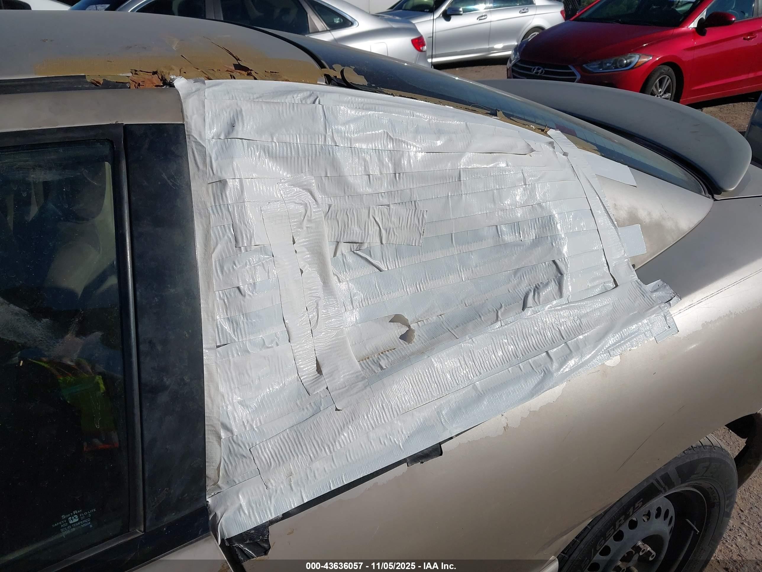 2003 Pontiac Sunfire   Tan vin: 1G2JB12F637113764