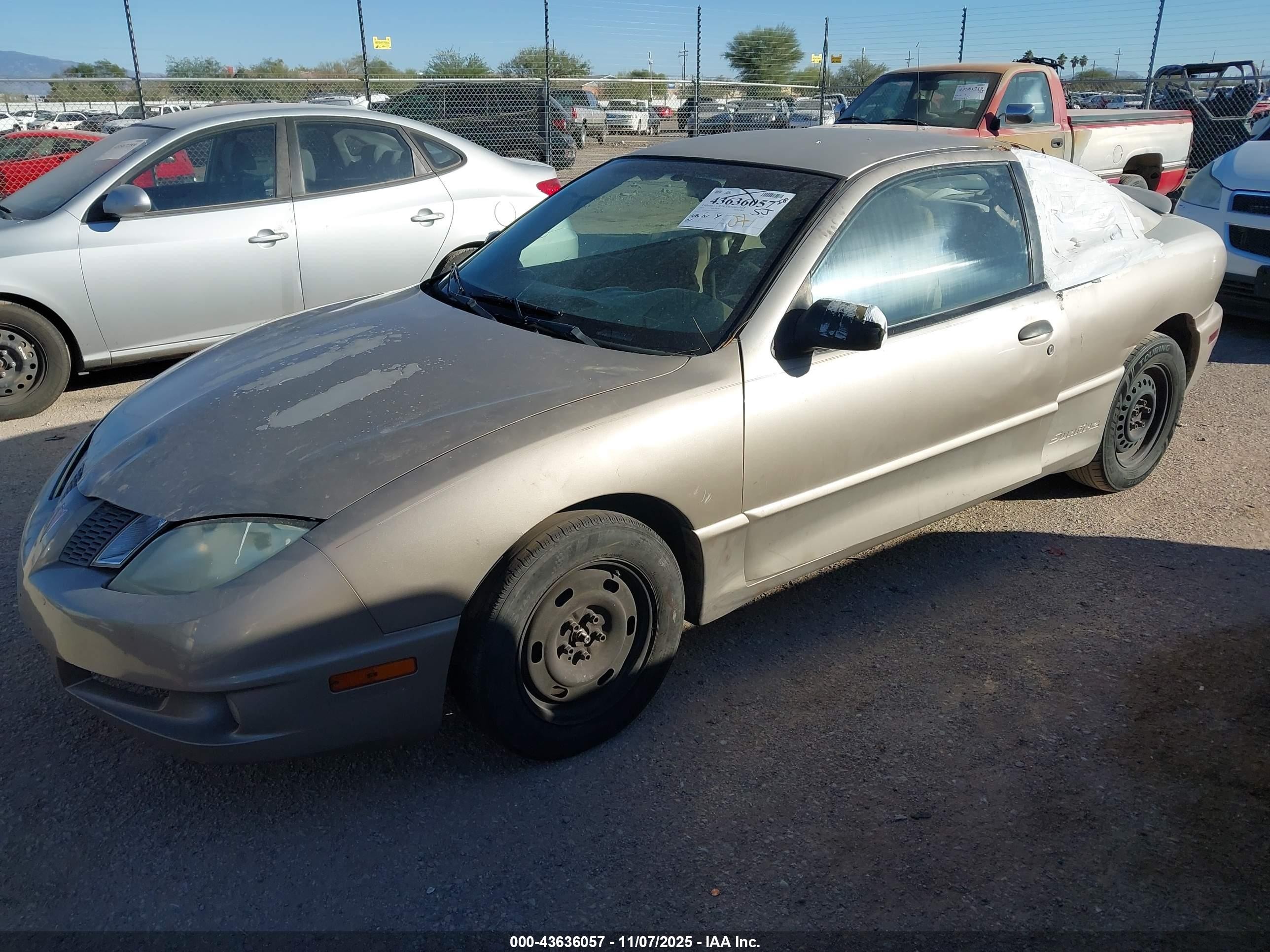 2003 Pontiac Sunfire   Tan vin: 1G2JB12F637113764