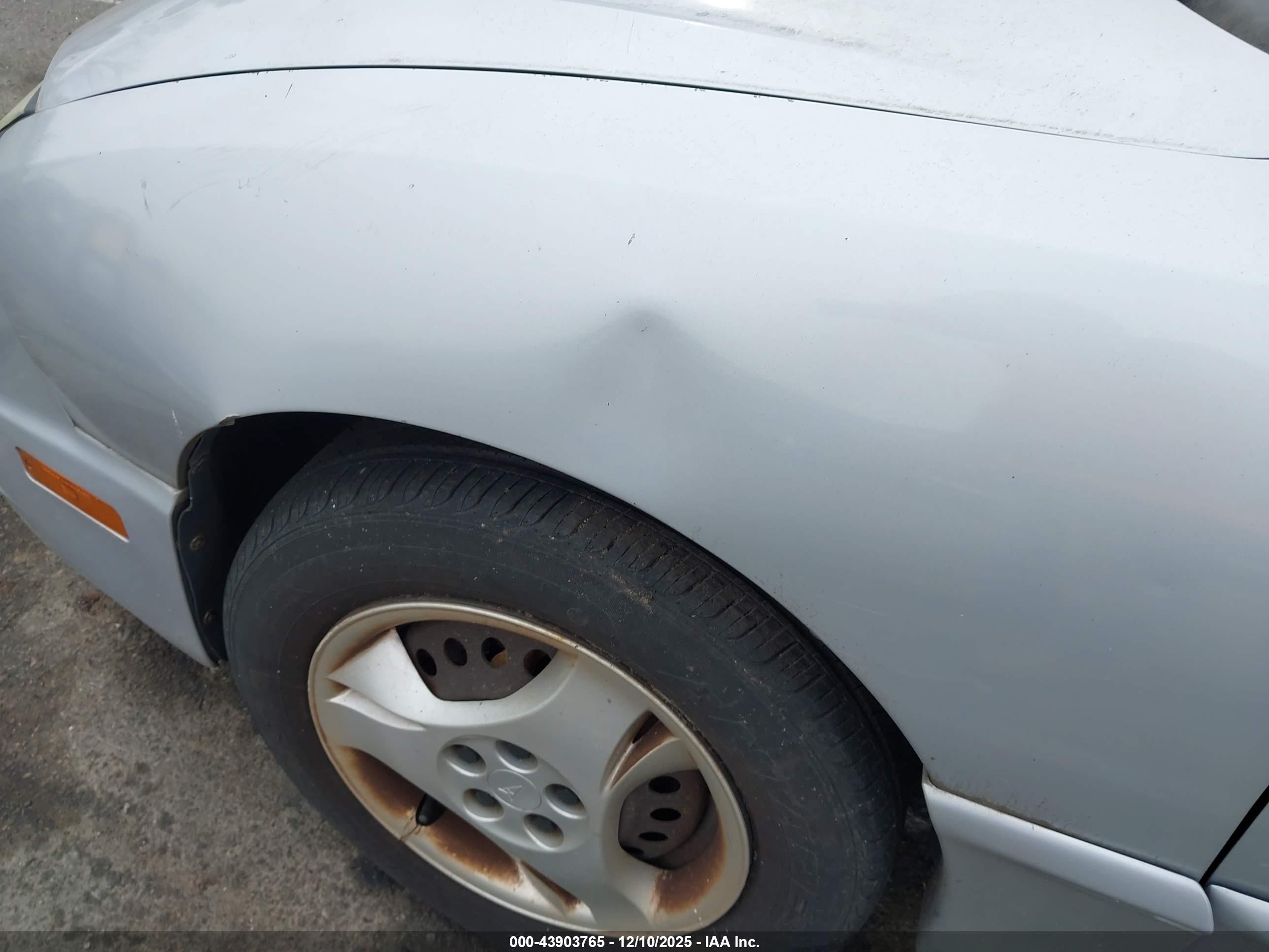 2004 Pontiac Sunfire   Серый vin: 1G2JB12F647221450