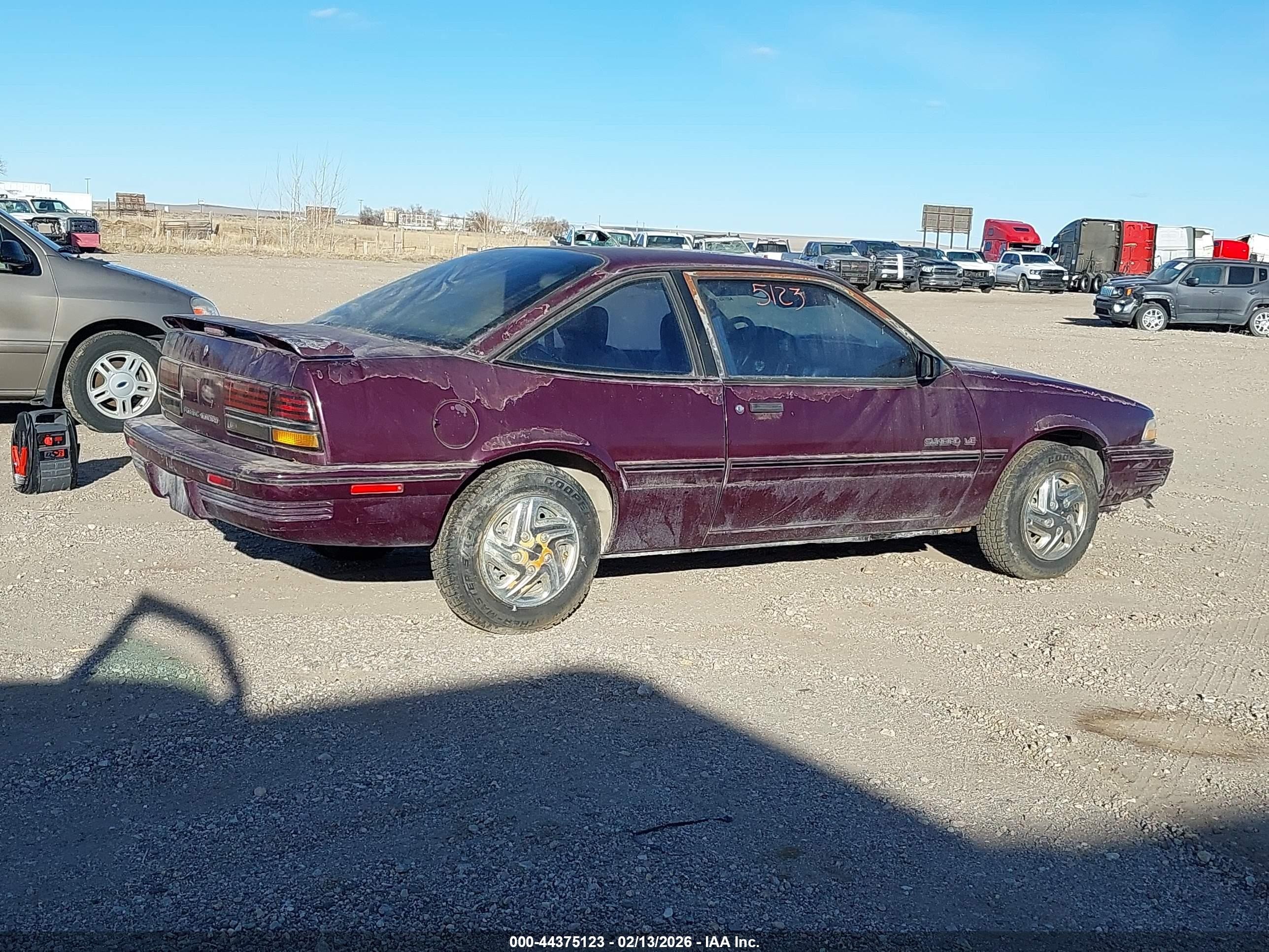 1994 Pontiac Sunbird Le Maroon vin: 1G2JB14H5R7538075