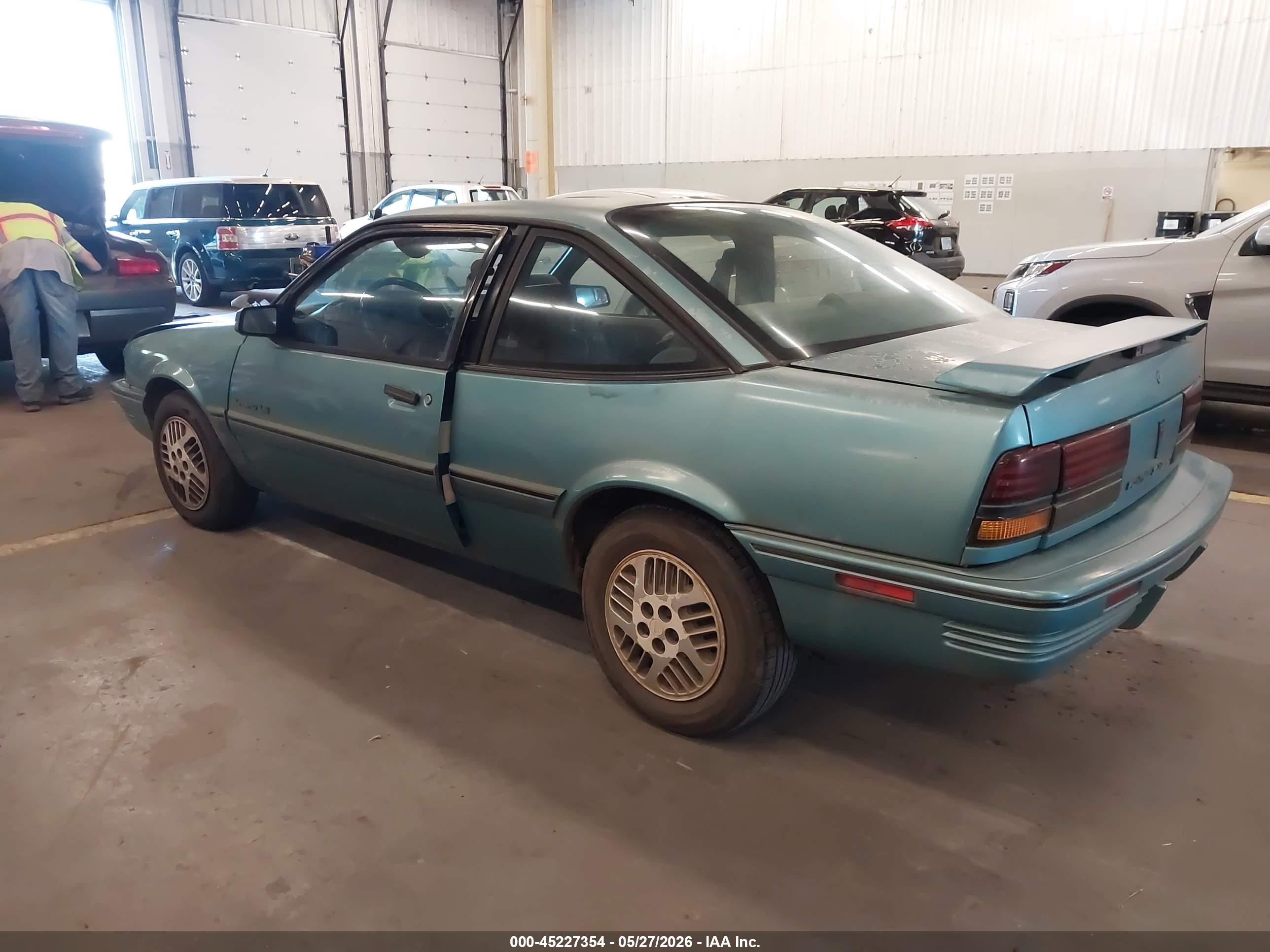 1994 Pontiac Sunbird Le Blue vin: 1G2JB14H9R7597047