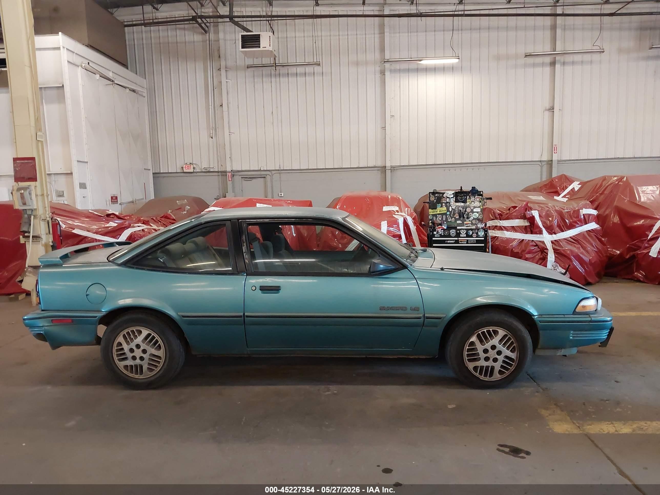 1994 Pontiac Sunbird Le Blue vin: 1G2JB14H9R7597047