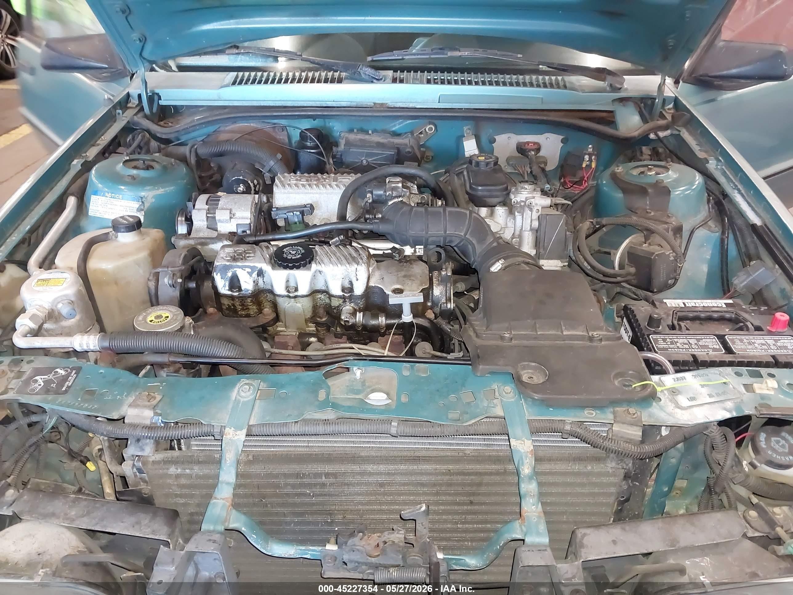 1994 Pontiac Sunbird Le Blue vin: 1G2JB14H9R7597047