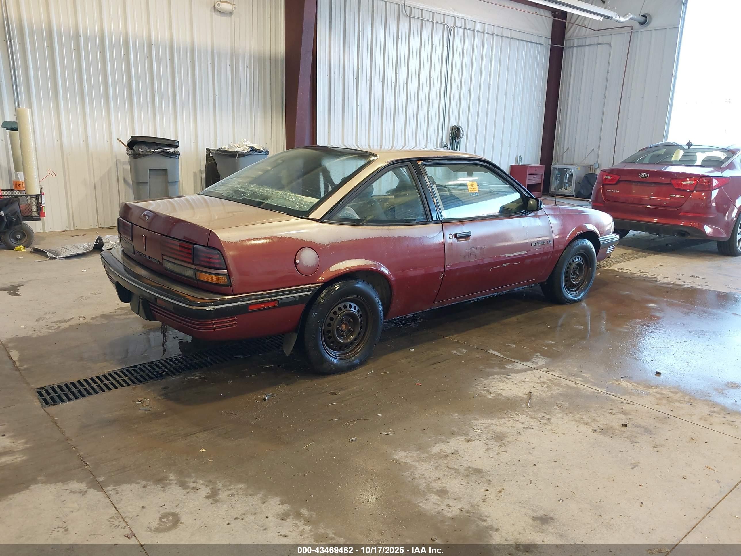 1991 Pontiac Sunbird Le Red vin: 1G2JB14K0M7591996