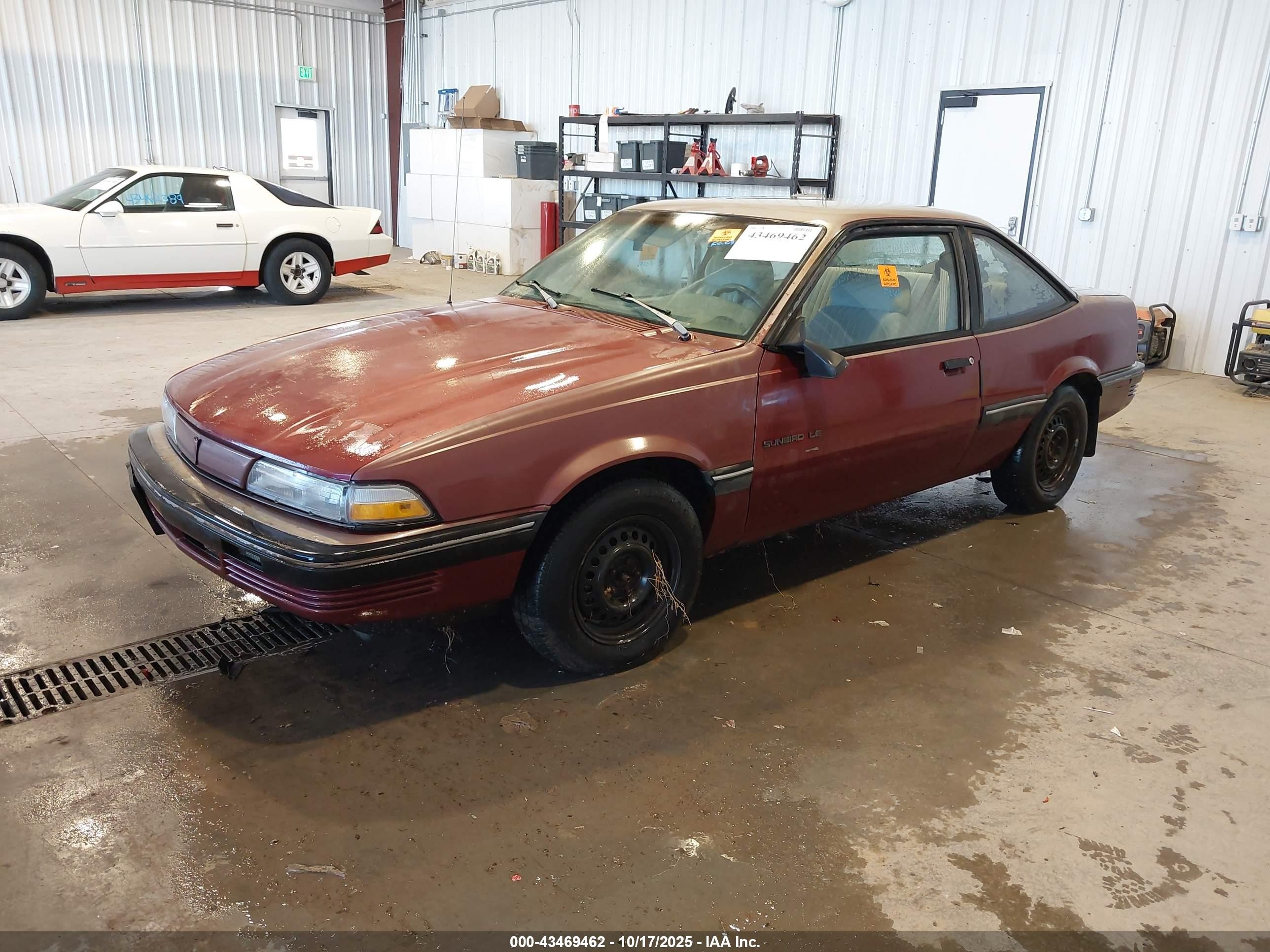1991 Pontiac Sunbird Le Red vin: 1G2JB14K0M7591996