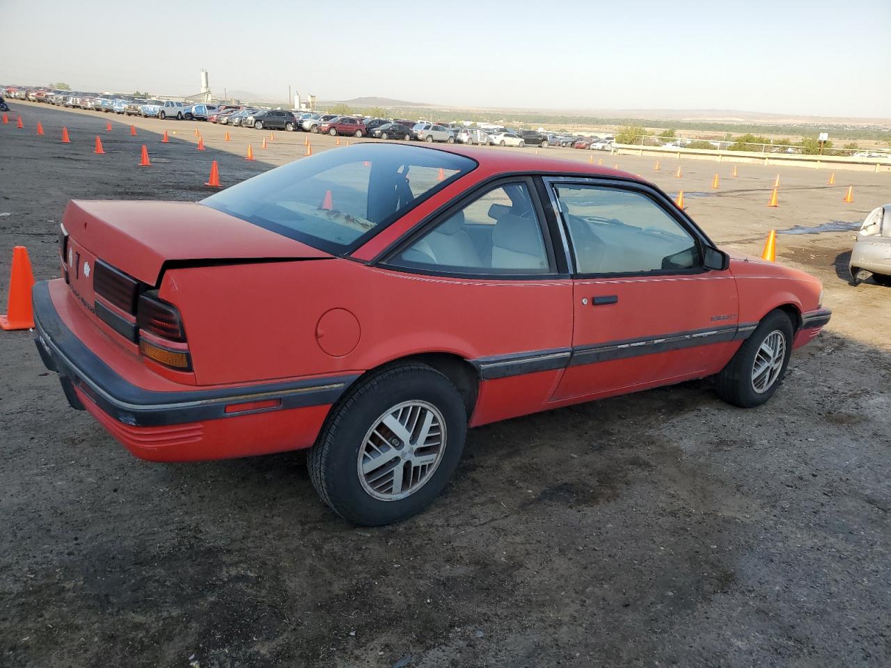 1990 Pontiac Sunbird Le   Red vin: 1G2JB14K6L7546253