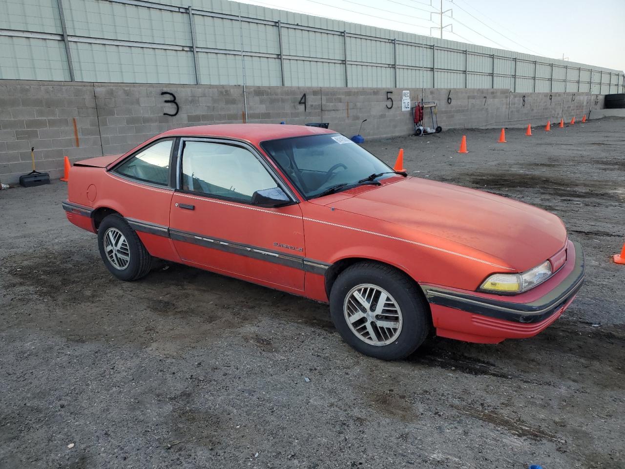 1990 Pontiac Sunbird Le   Red vin: 1G2JB14K6L7546253