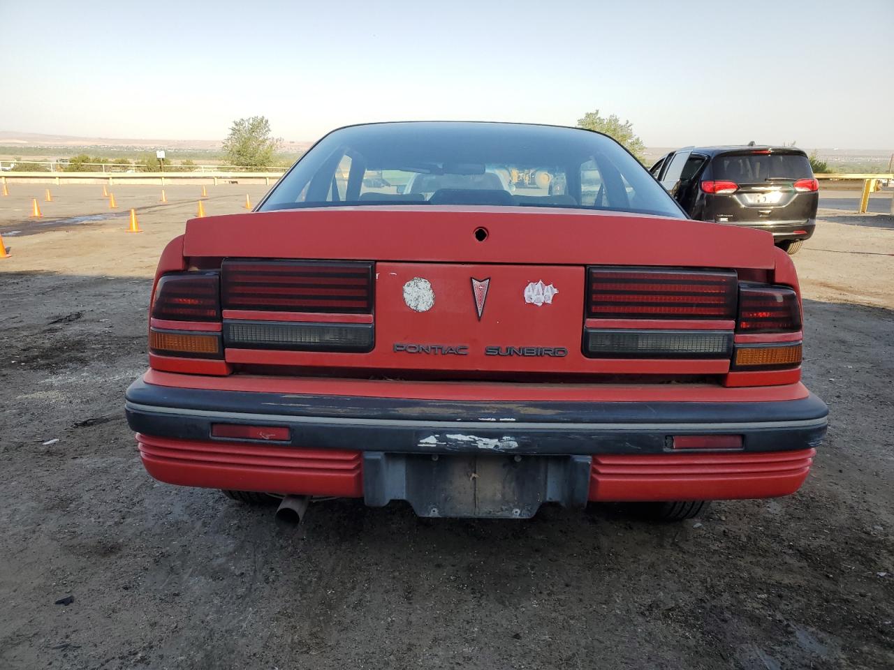 1990 Pontiac Sunbird Le   Red vin: 1G2JB14K6L7546253