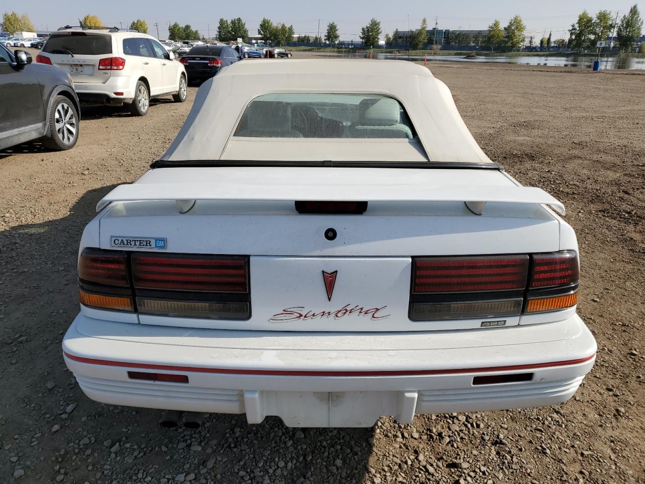 1994 Pontiac Sunbird Le Белый vin: 1G2JB31TXR7536424