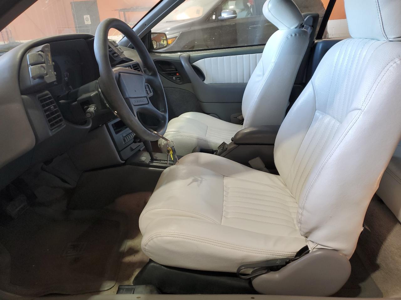 1994 Pontiac Sunbird Le Белый vin: 1G2JB31TXR7536424