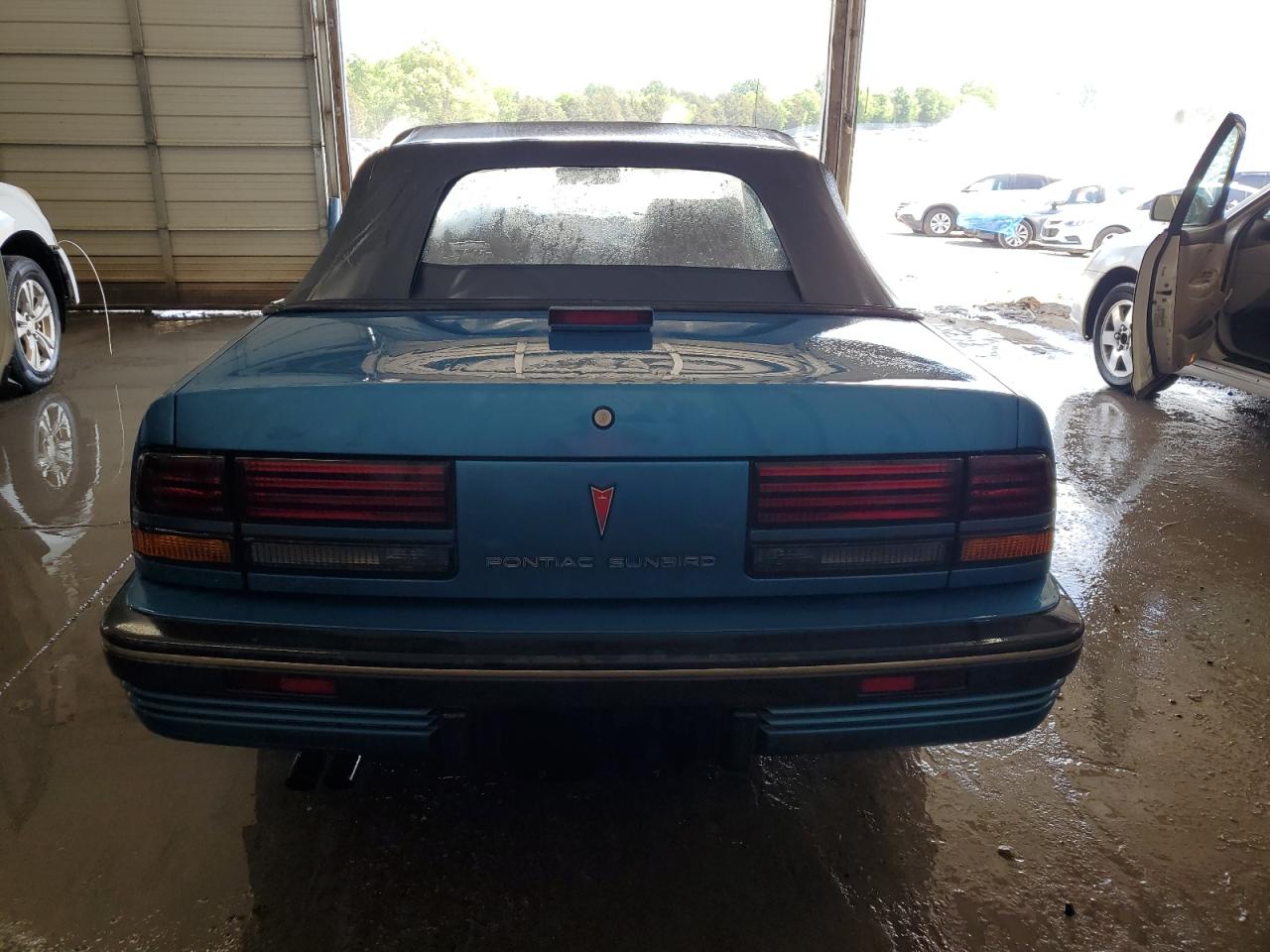 1991 Pontiac Sunbird Le Blue vin: 1G2JB34T0M7628033
