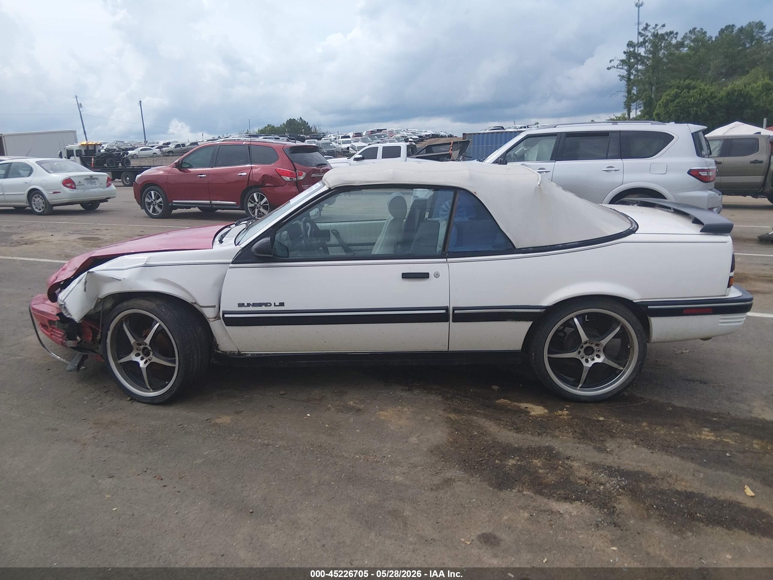 1991 Pontiac Sunbird Le Red vin: 1G2JB34T2M7609919