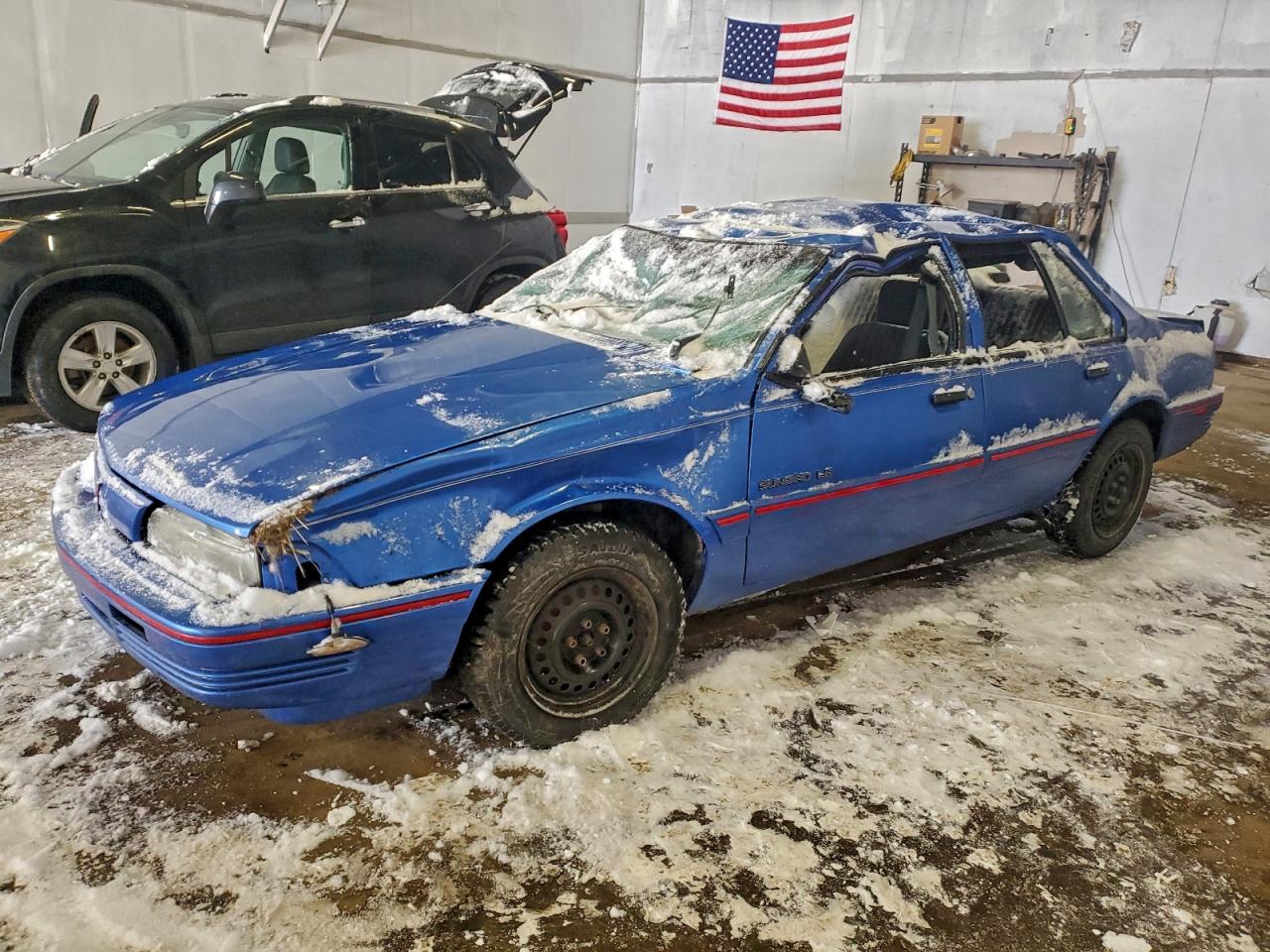 1994 Pontiac Sunbird Le Blue vin: 1G2JB54H4R7600136