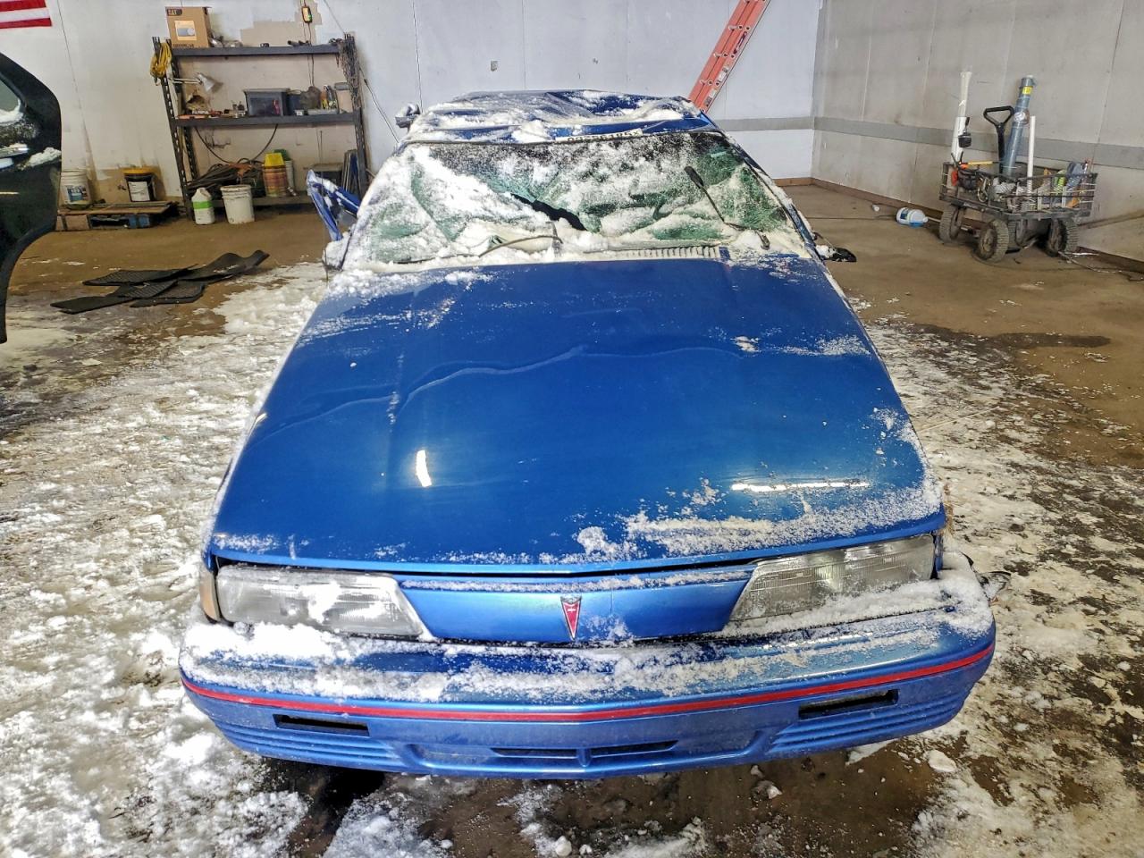 1994 Pontiac Sunbird Le Blue vin: 1G2JB54H4R7600136