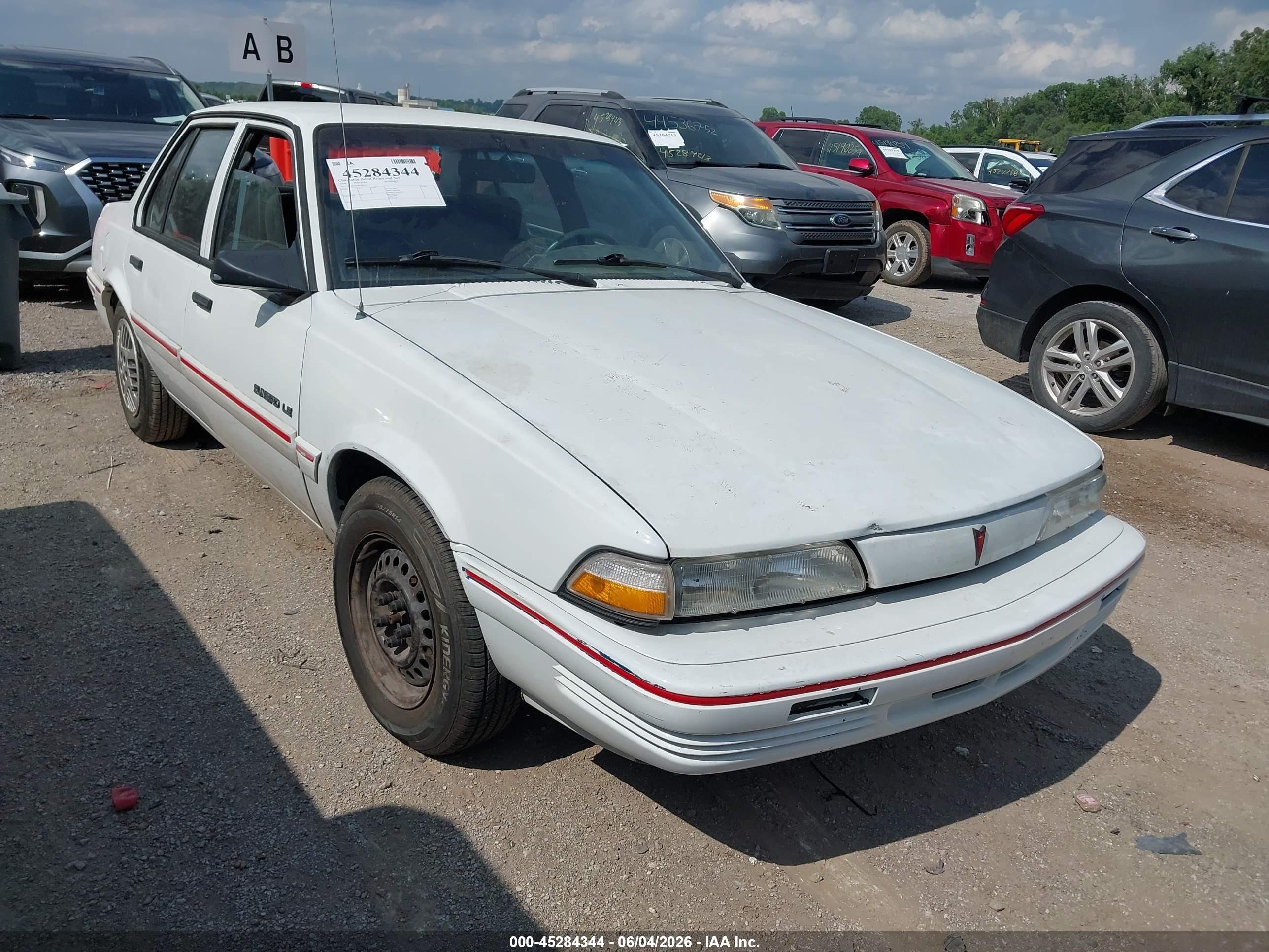1994 Pontiac Sunbird Le White vin: 1G2JB54H5R7582455