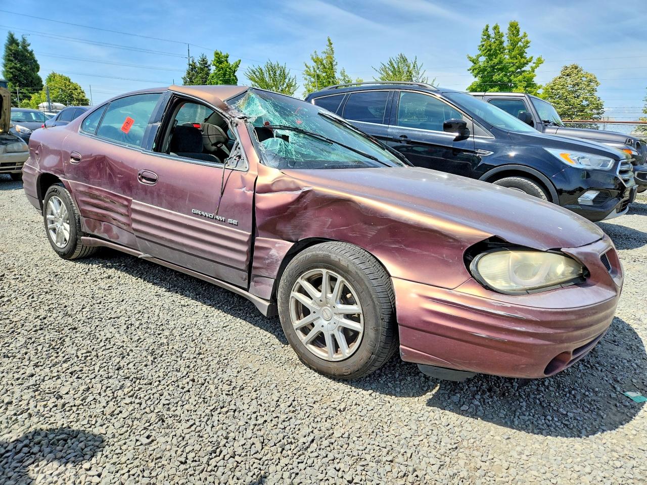 1999 Pontiac Grand Am Se Orange vin: 1G2NE52T3XC540841