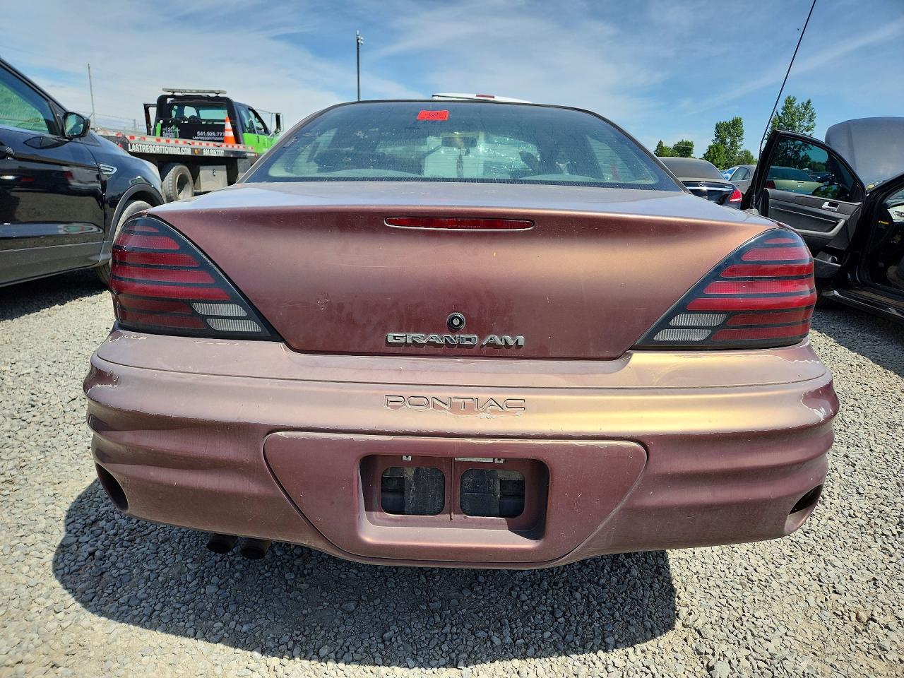 1999 Pontiac Grand Am Se Orange vin: 1G2NE52T3XC540841