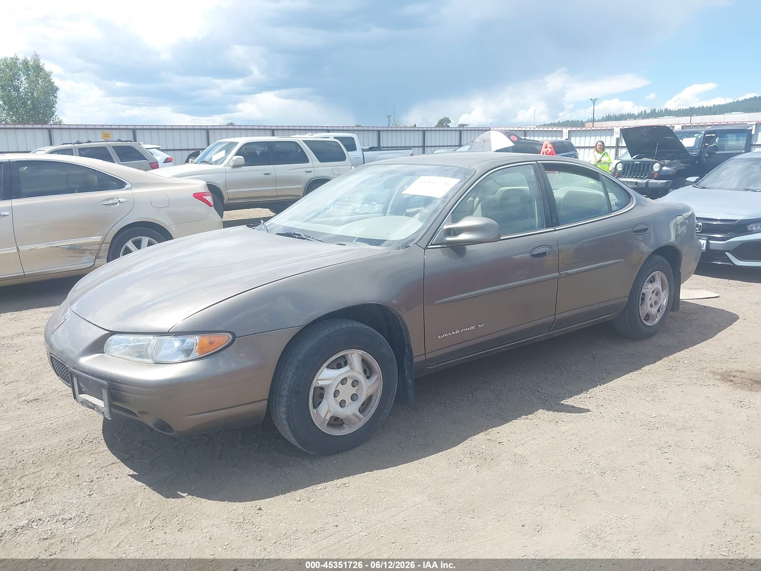 2000 Pontiac Grand Prix Se Brown vin: 1G2WJ52J5YF273300