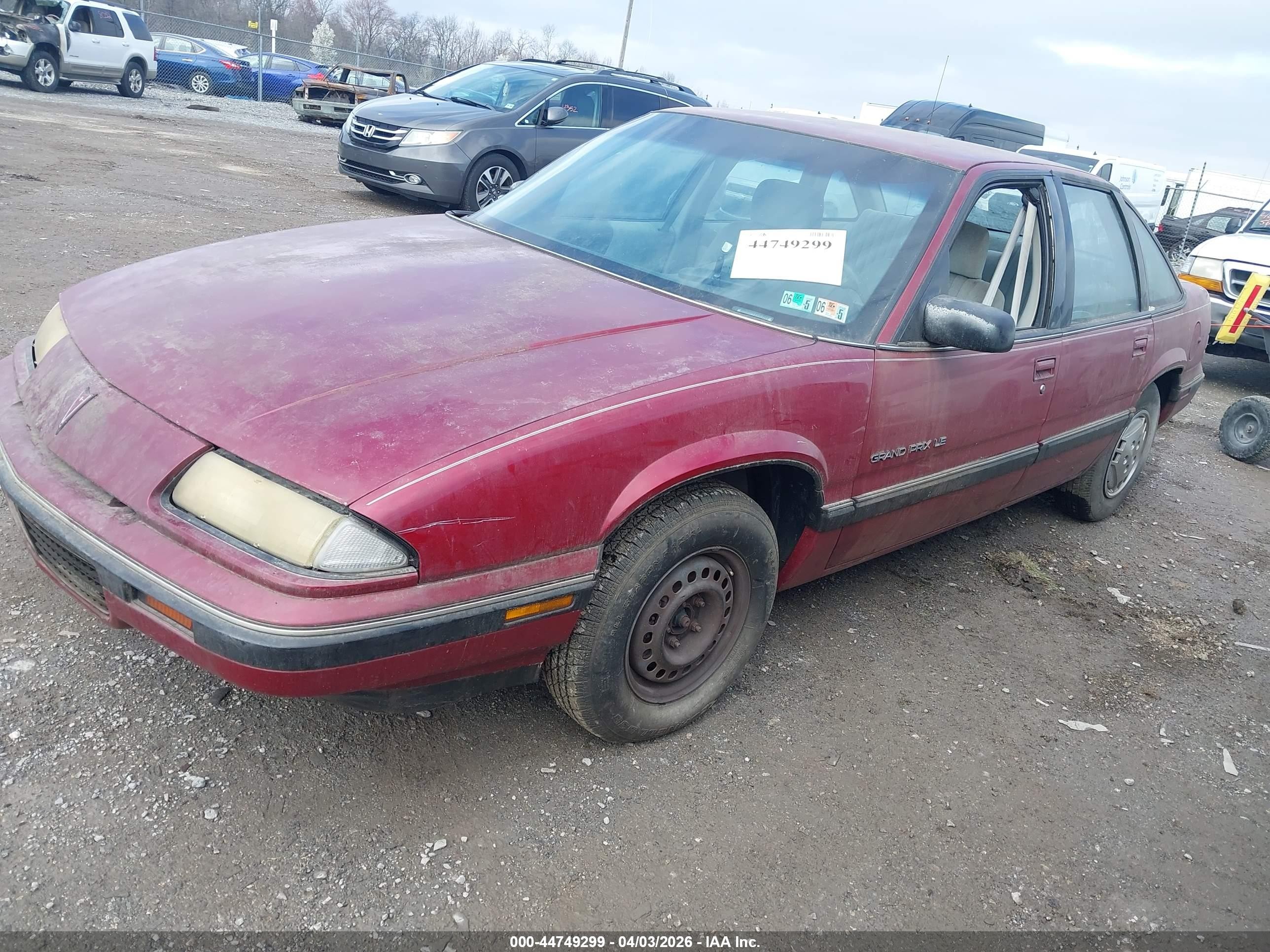 1990 Pontiac Grand Prix Le Maroon vin: 1G2WJ54T7LF282295