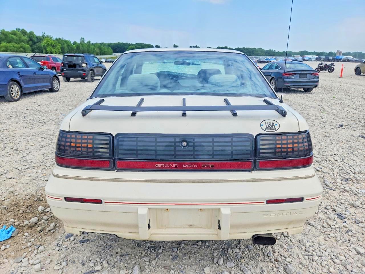 1990 Pontiac Grand Prix Ste Белый vin: 1G2WT54T1LF304317