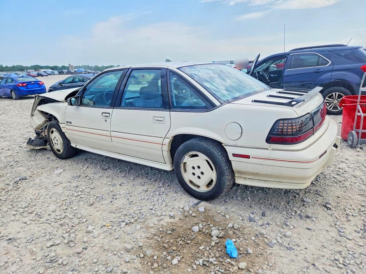 1990 Pontiac Grand Prix Ste Белый vin: 1G2WT54T1LF304317
