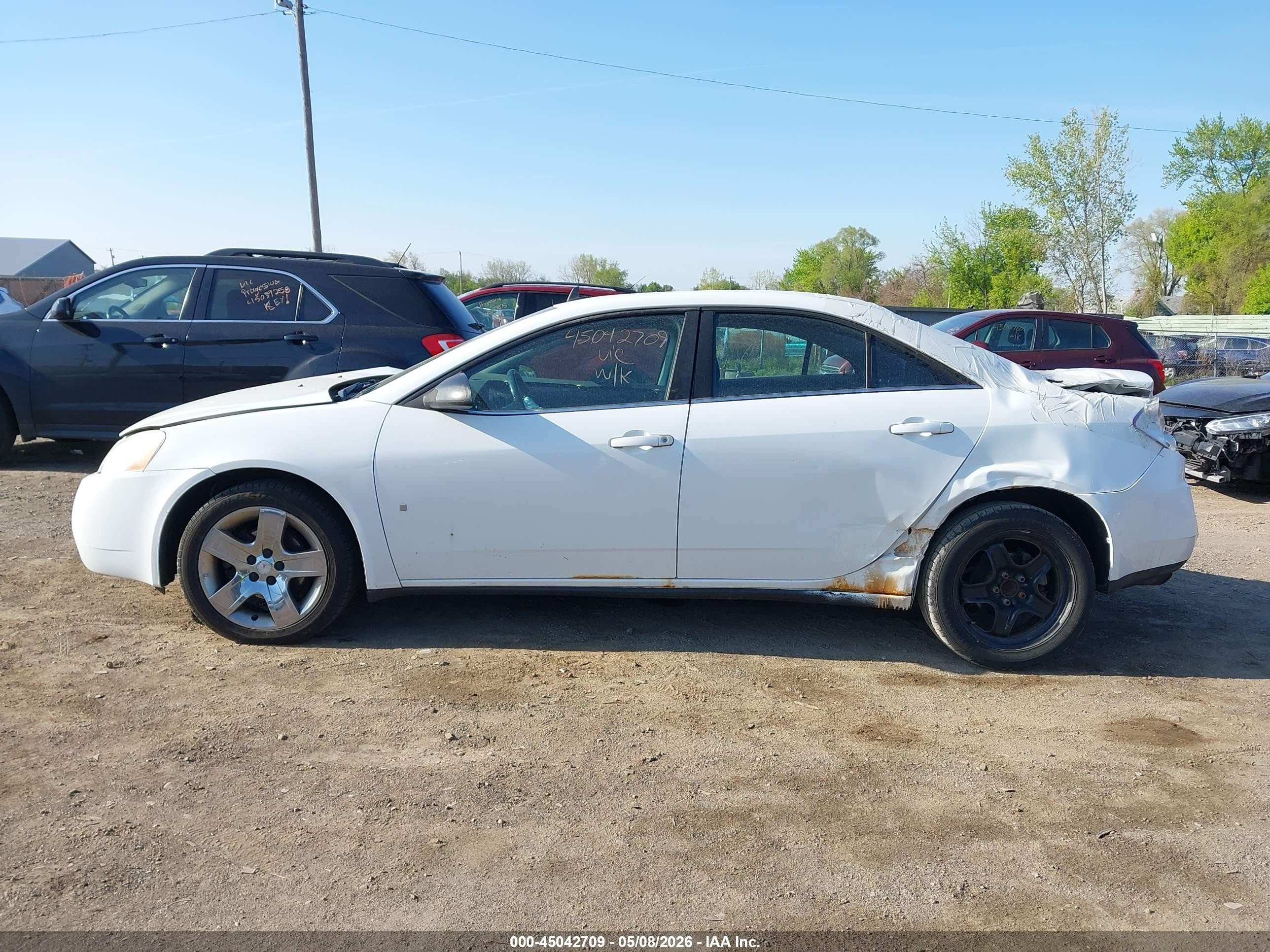 2009 Pontiac G6   Белый vin: 1G2ZG57B094202905