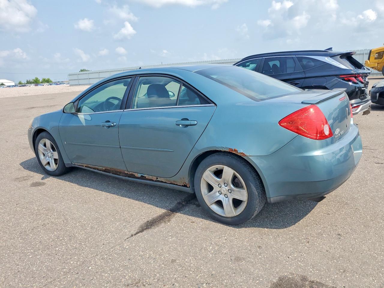 2009 Pontiac G6 Teal vin: 1G2ZG57B494154616