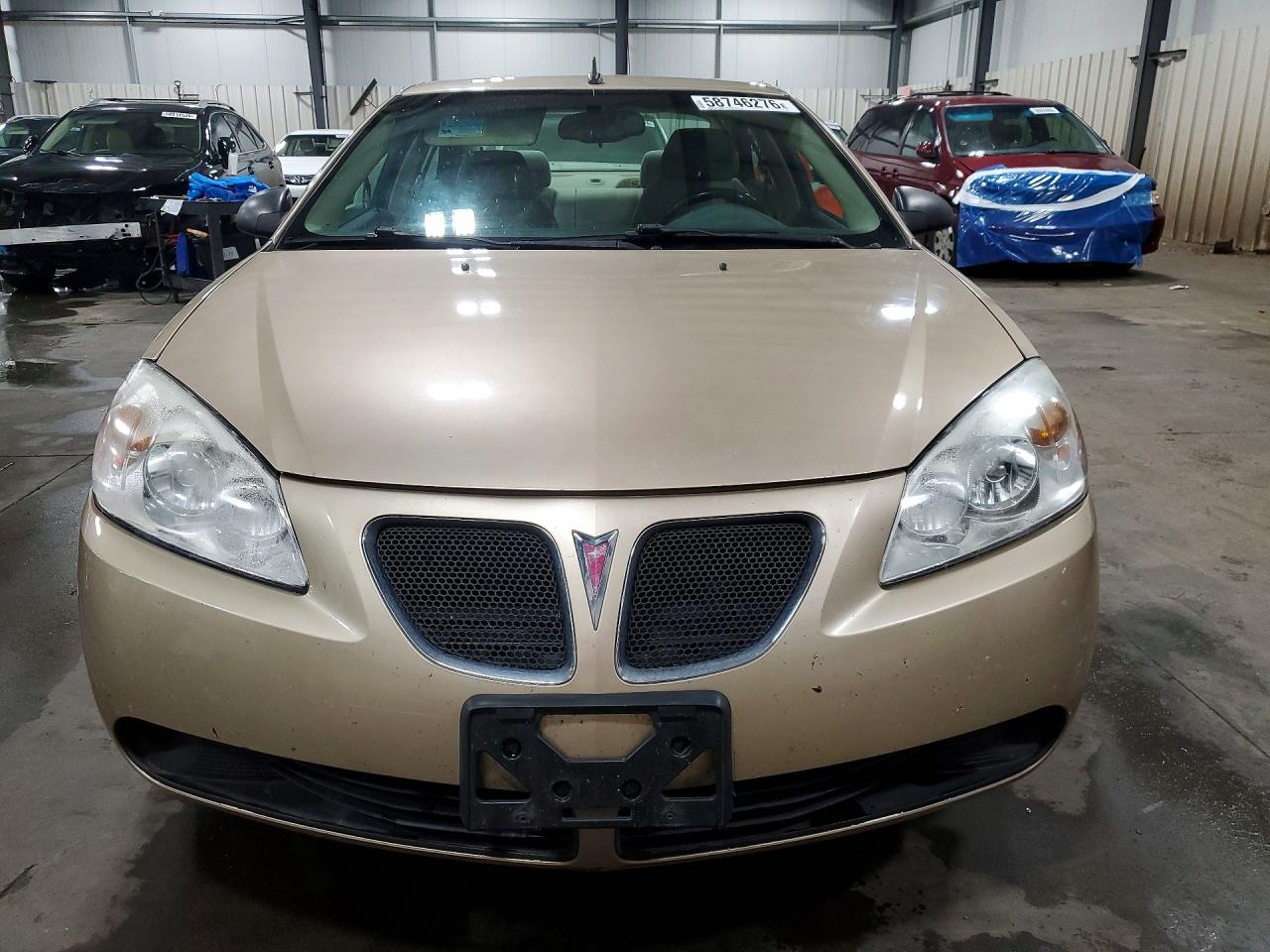 2008 Pontiac G6 Base Tan vin: 1G2ZG57B984175590